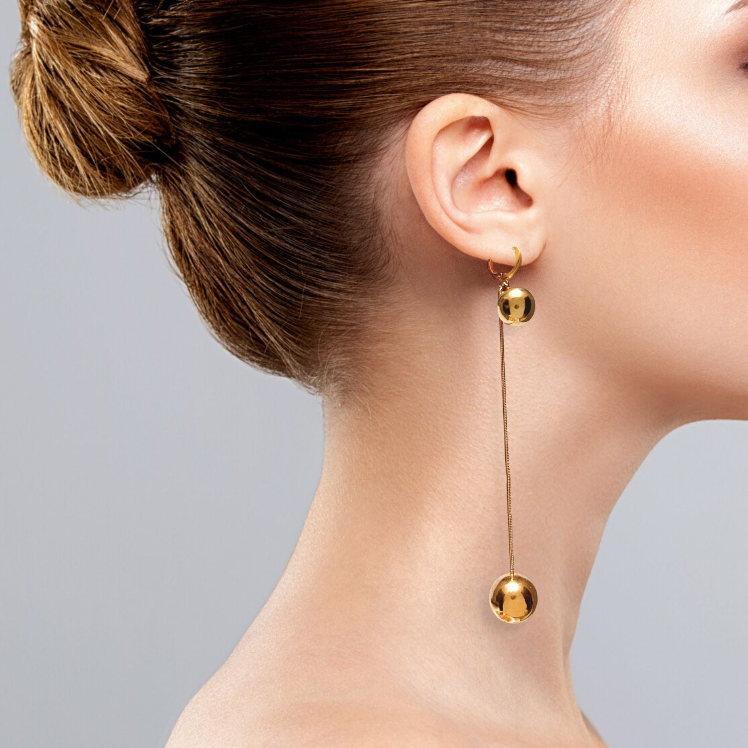 Gold Orbita Swing Hook Earrings