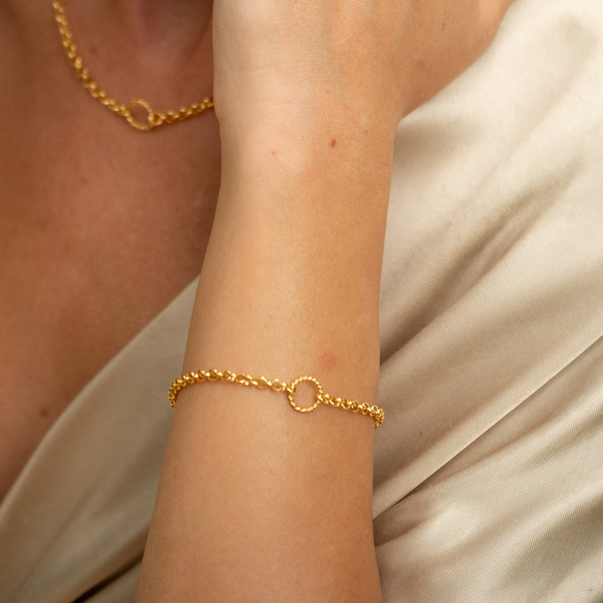 Gold Plated Eternity Twist Charm Bracelet