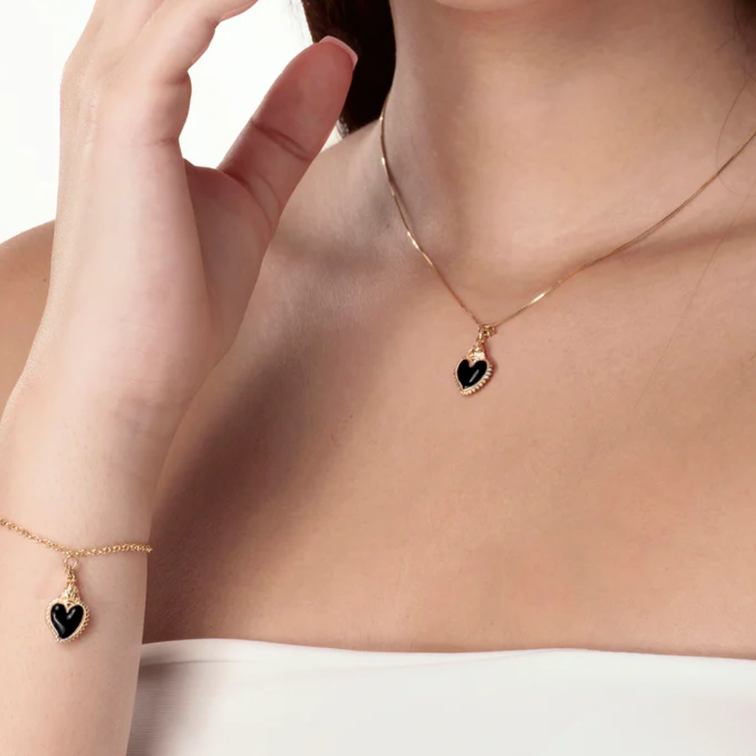 Gold-Plated Necklace With Black Heart Pendant