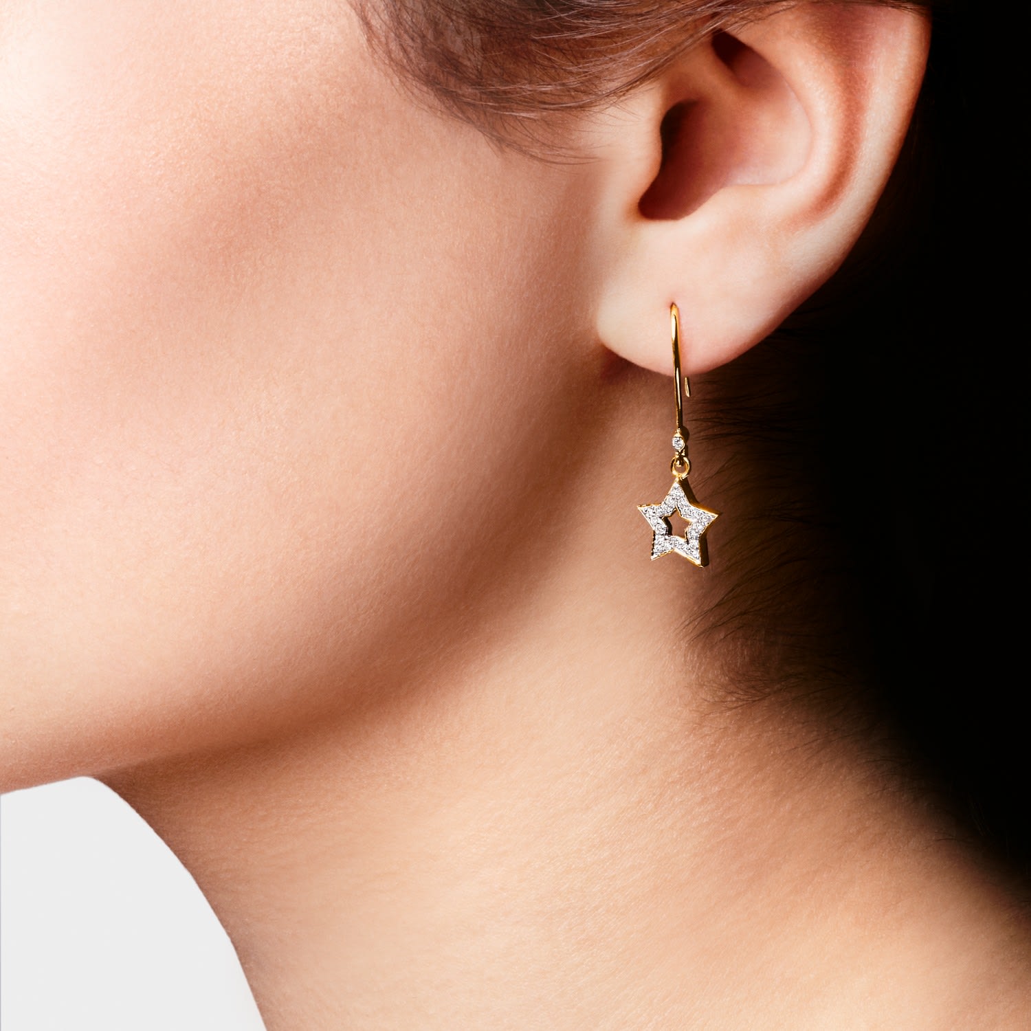 Dangly Starry Earrings In Yellow Gold