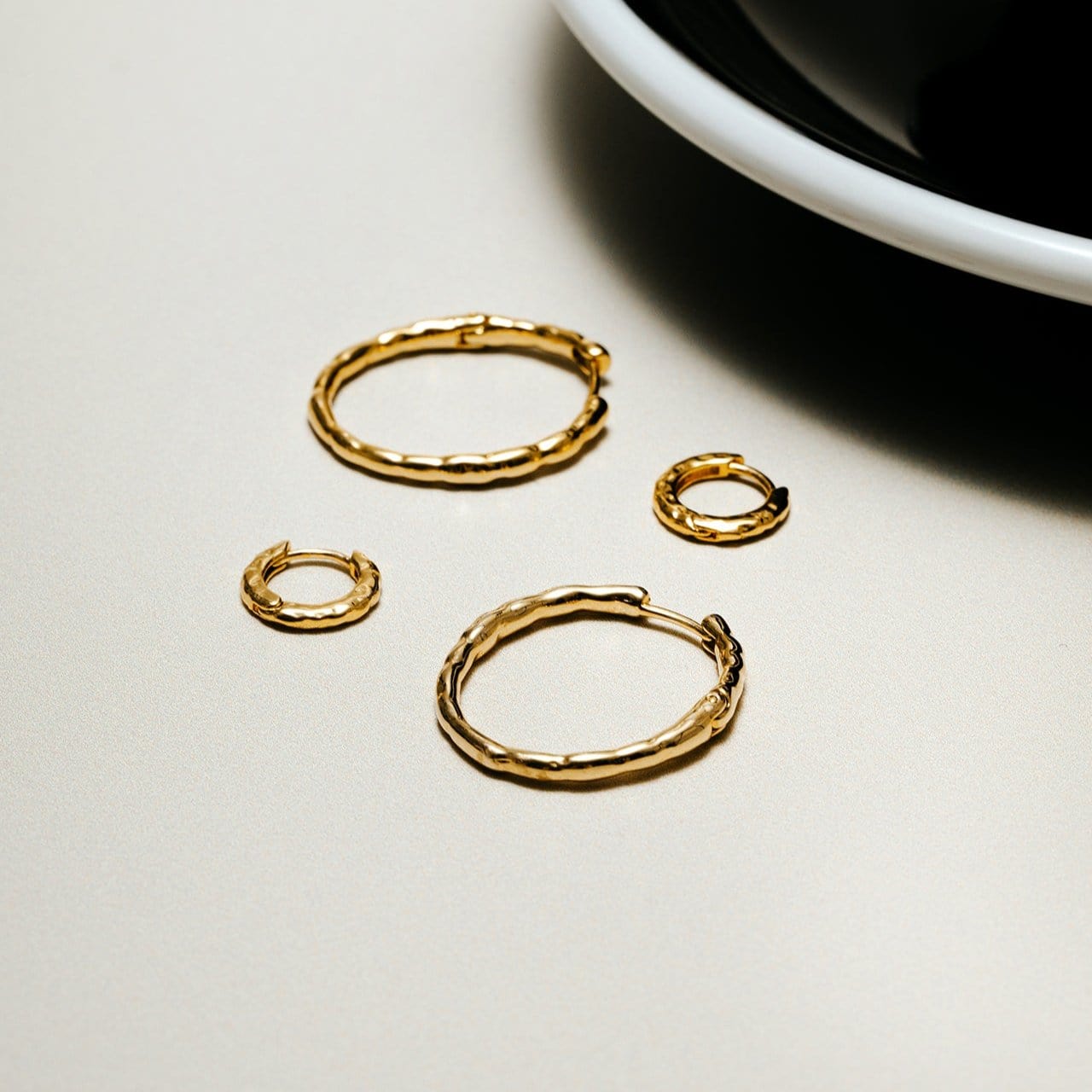 Polished Molten Micro Hoop Earrings