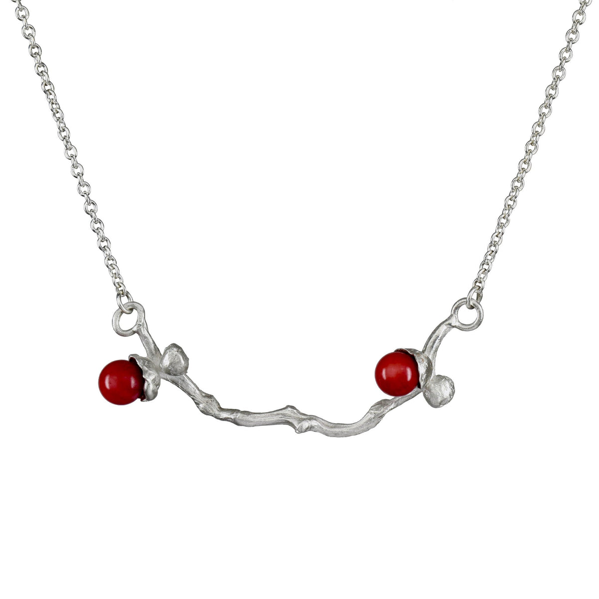 the silver coral bead necklace on a dates' branch ready to ship