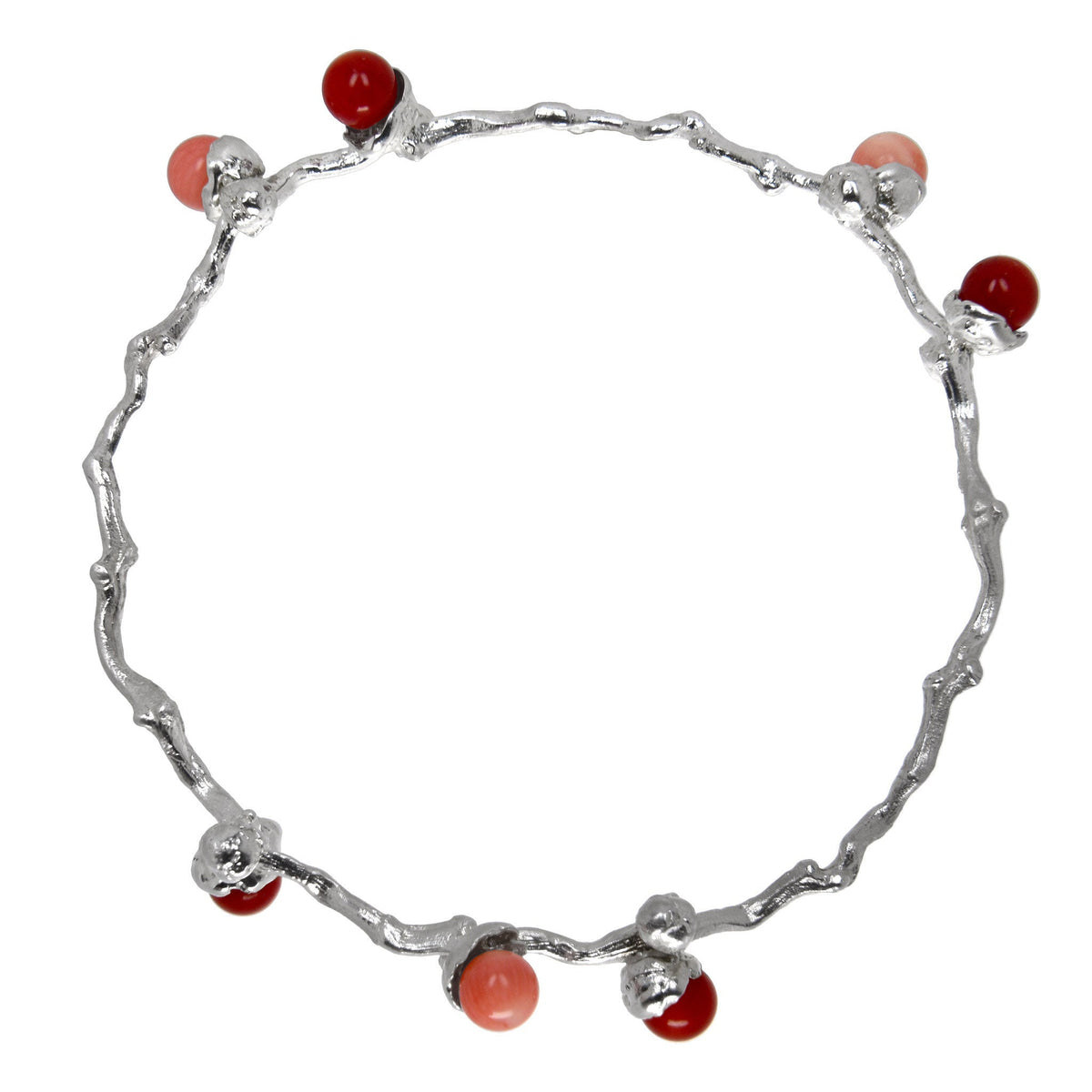 the silver coral beads bangle on a dates' branch