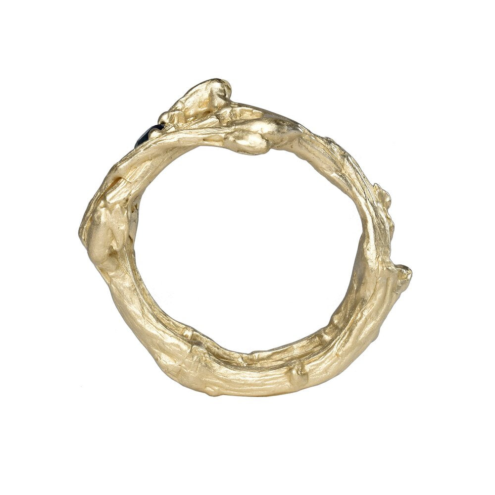 The twig branch in 10 K yellow gold with a blue sapphire wedding ring every day wear