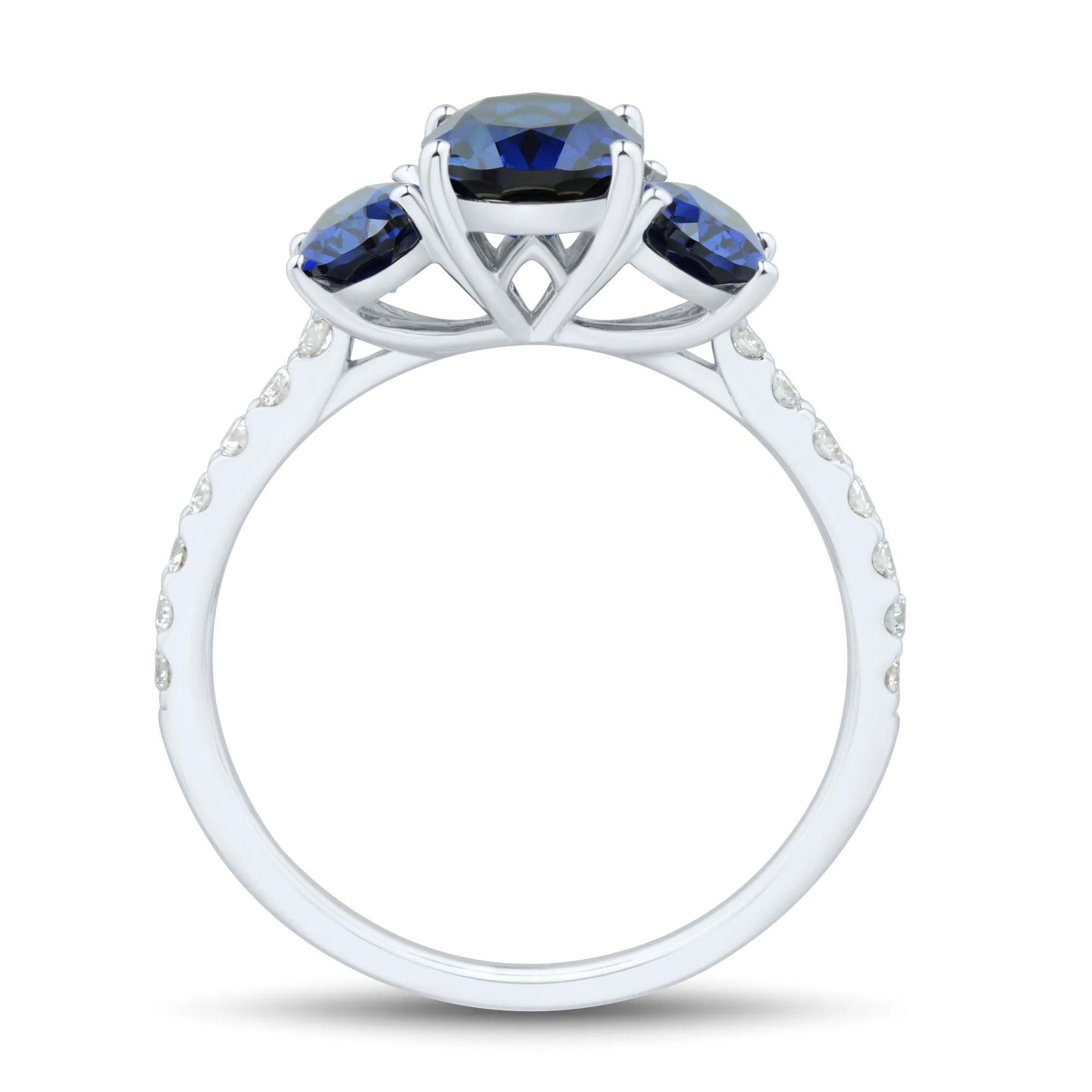 1/5 CT. Tw. Lab-Created Blue Sapphire and Lab Grown Diamond Three-Stone Ring 10K White Gold Size 7 1mm