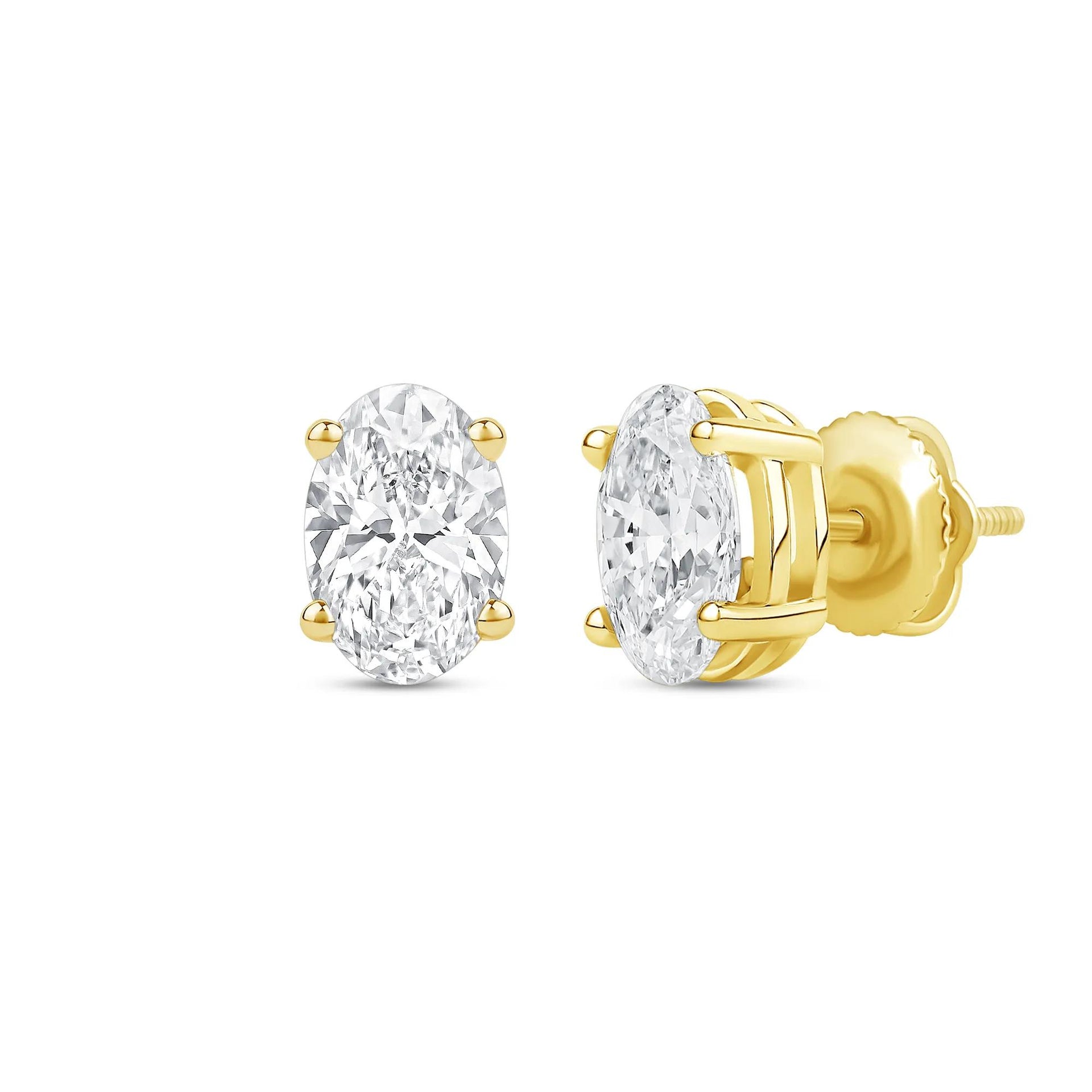 3 CT. Tw. Lab Grown Diamond Oval-Shaped Solitaire Stud Earrings 14K Yellow Gold Size 9.70mm