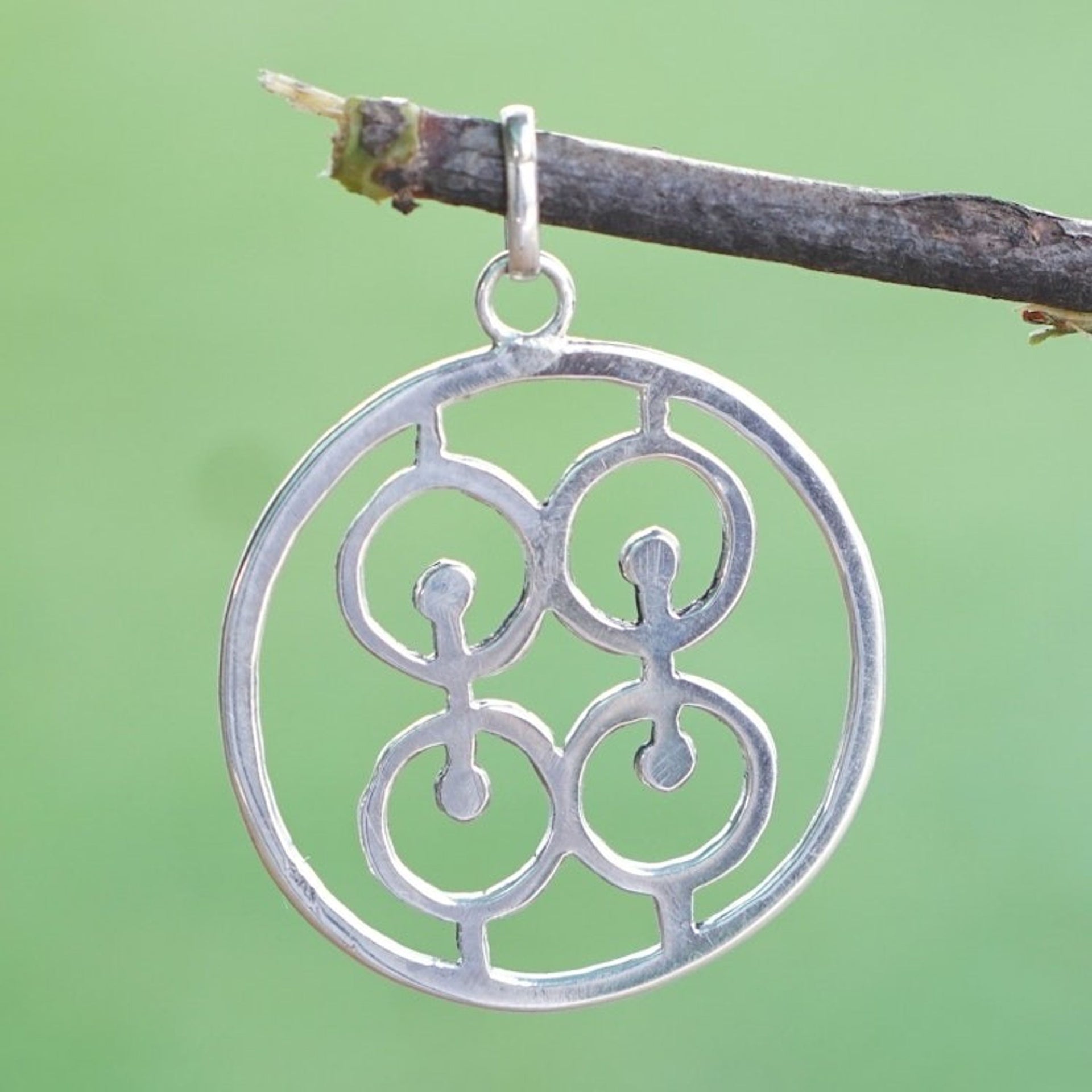 Sterling Silver Round Pendant with Modern Icon from Ghana 'Commitment Core'