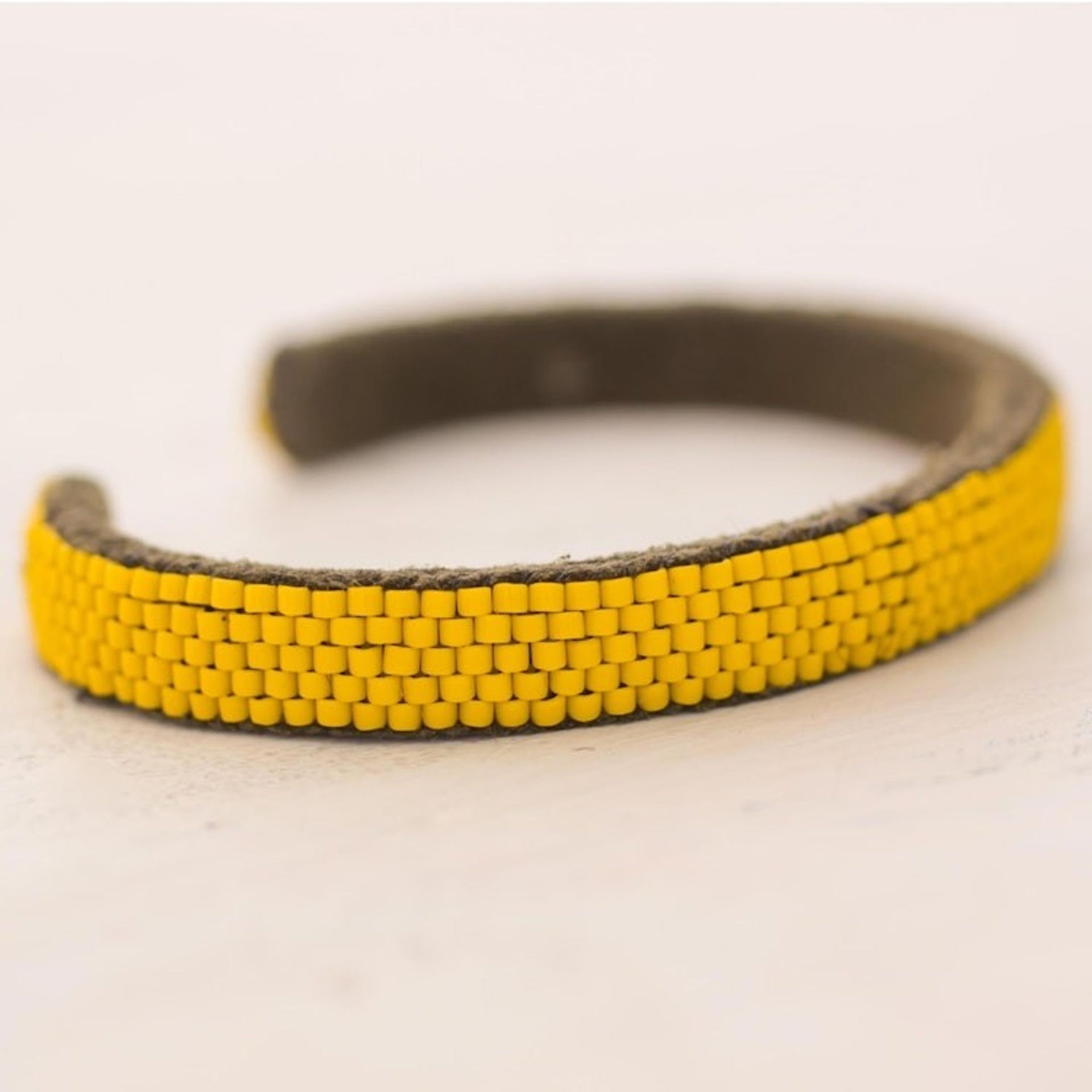 Glass Beaded Cuff Bracelet in Solid Yellow from El Salvador 'Beautiful Horizon in Yellow'