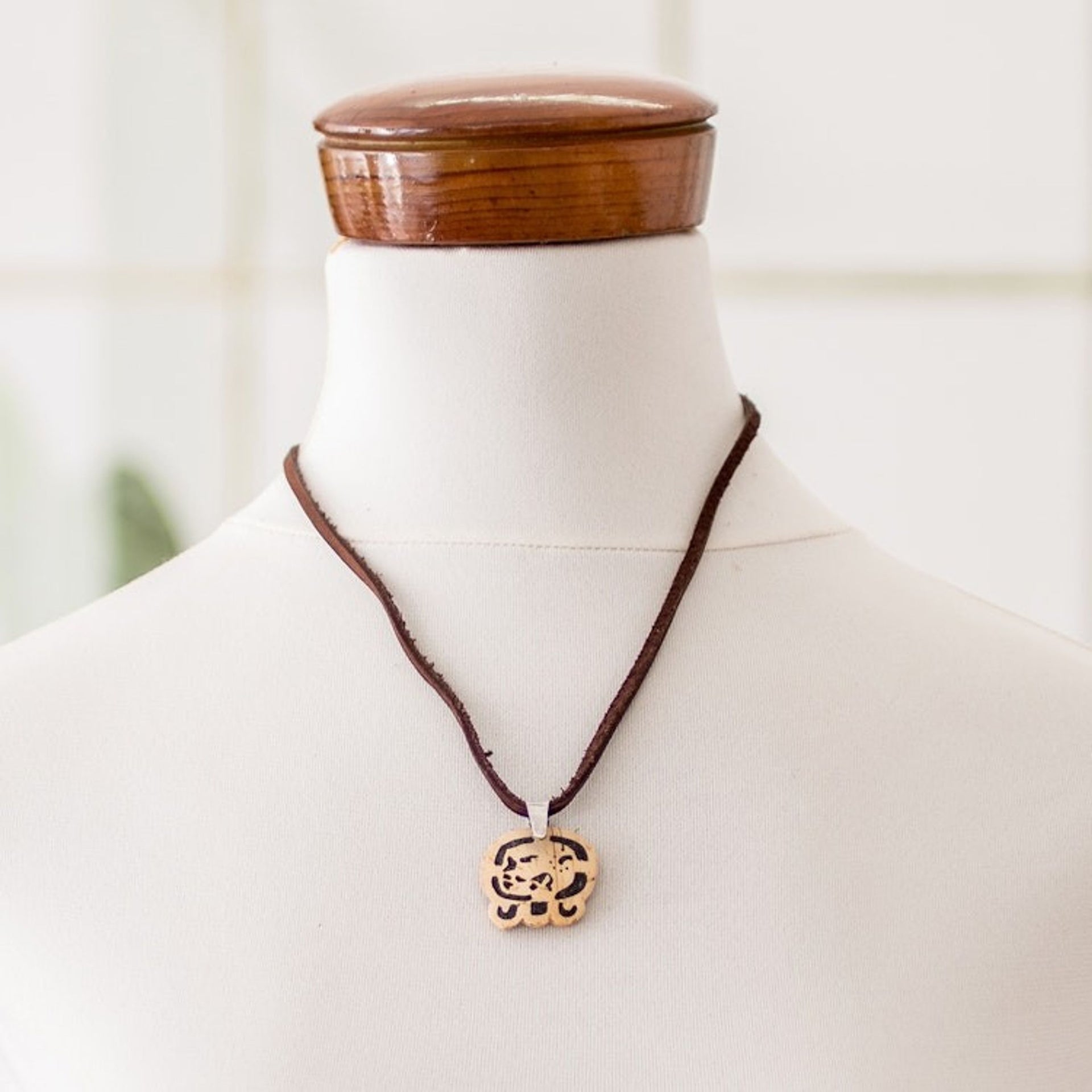 Coconut Shell and Lava Stone Maya E Sign Pendant Necklace 'Free Path'