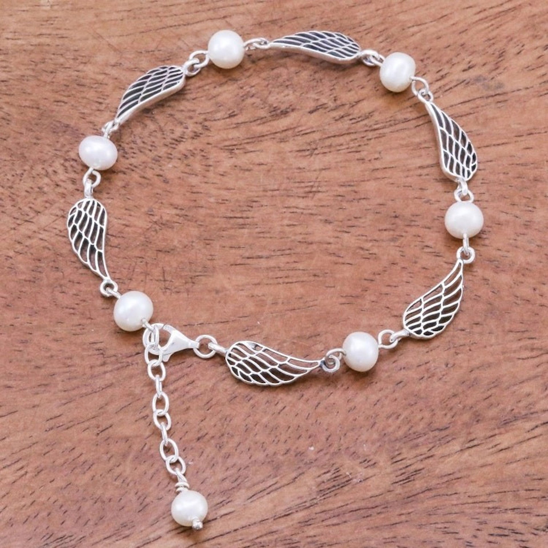 Thai Handcrafted Cultured Pearl Bracelet with Silver Wings 'Flying Free'