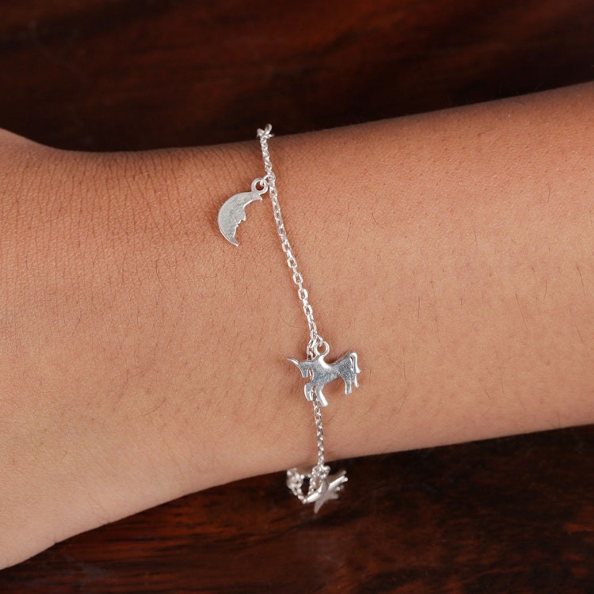 Fair Trade Horse and Star Sterling Silver Charm Bracelet 'Prairie Luck'