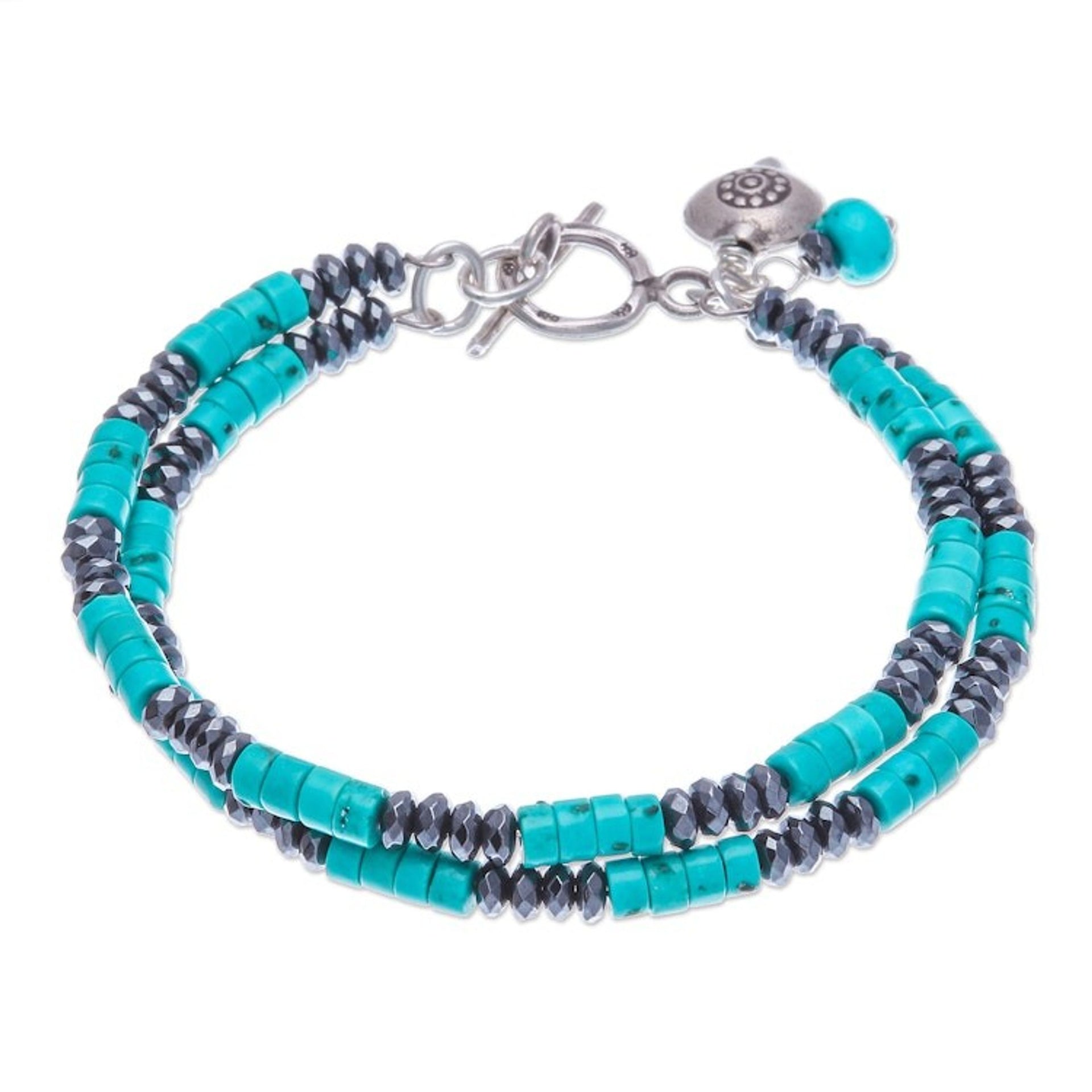 Hematite and Recon Turquoise Beaded Bracelet with Charms 'Spaced Energies'