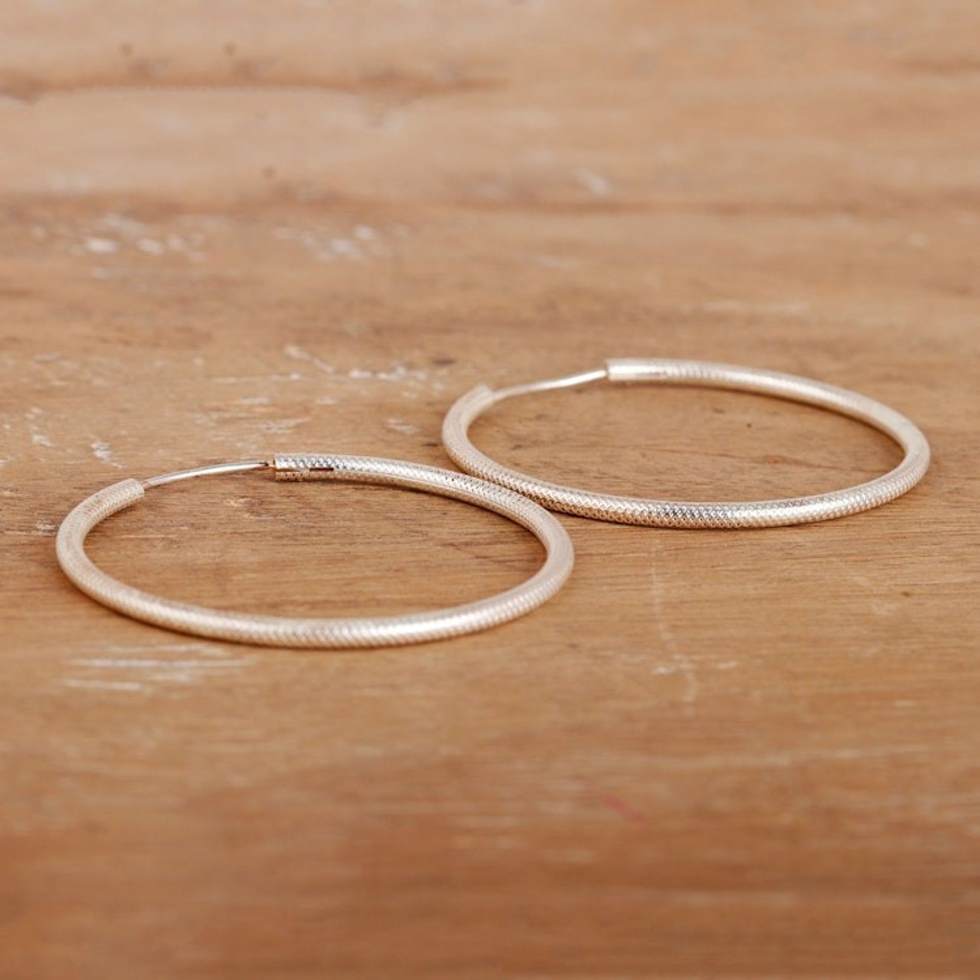Modern High-Polished Round Sterling Silver Hoop Earrings 'Stylish Loop'