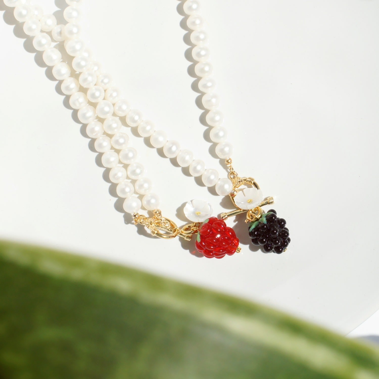 Very Berry Pearl Necklace With Glass Rasbperry Pendant And Mother Of Pearl Flower