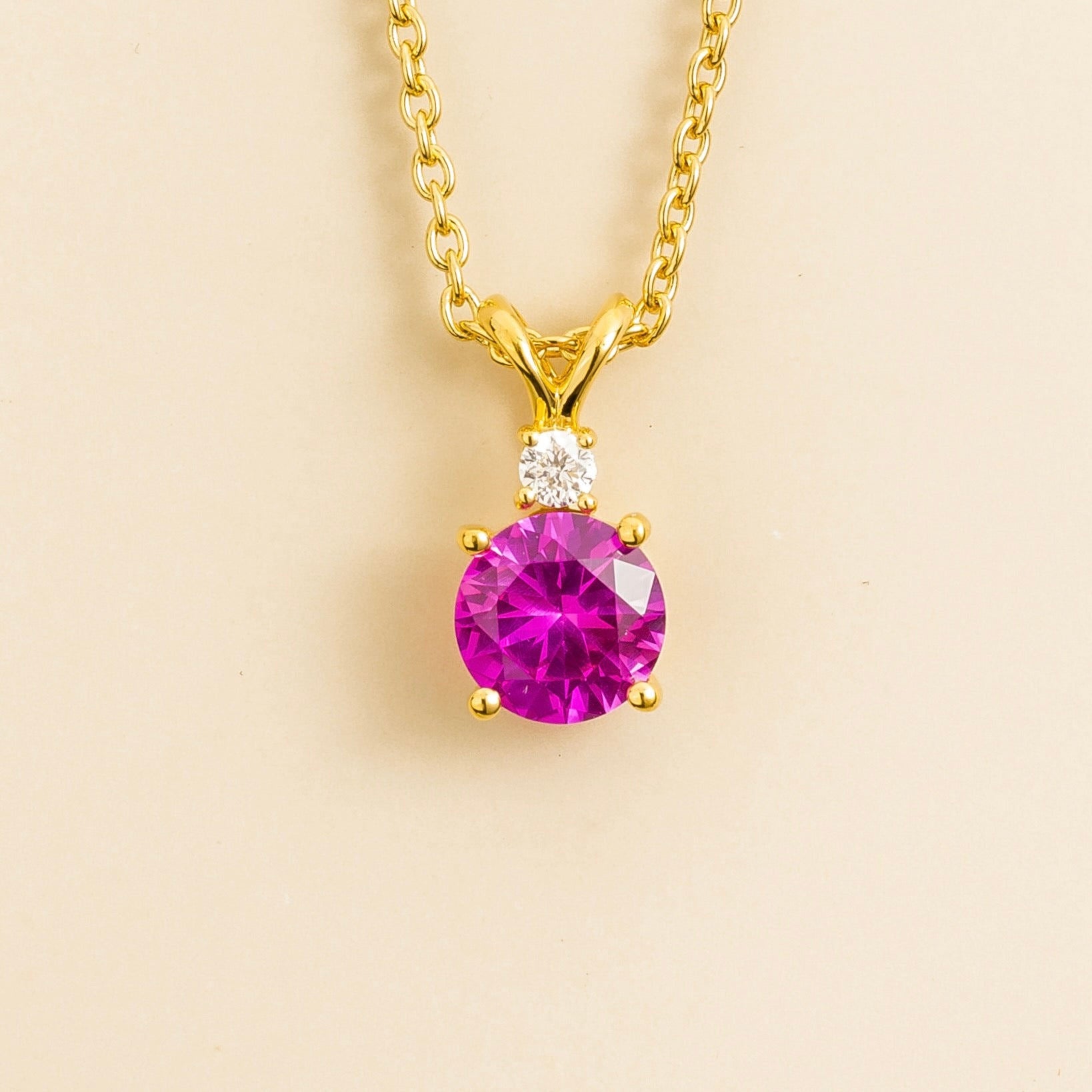 Joie Pendant Necklace In Vivid Pink Sapphire & Diamond Set In Gold