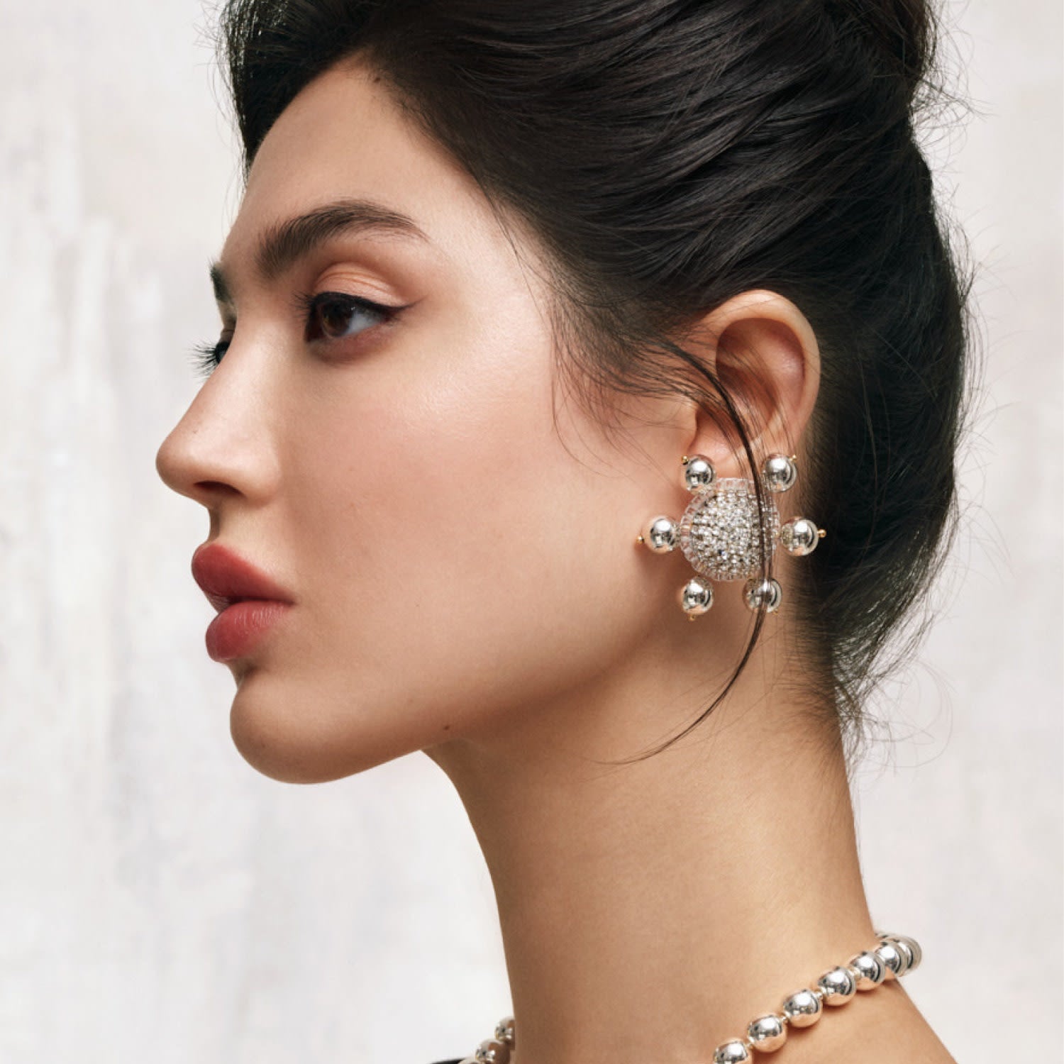 Jolie Clip On Earrings In Silver Gloss