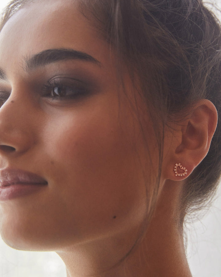ari-heart-gold-stud-earrings-in-white-swarovski