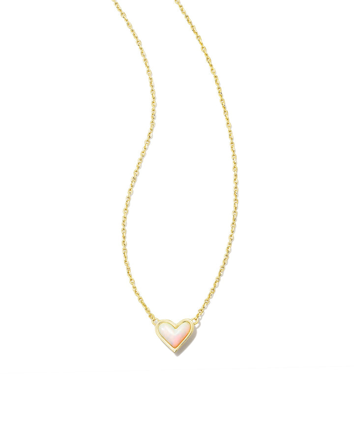 framed-ari-heart-gold-short-pendant-necklace-in-white-opalescent-resin-swarovski