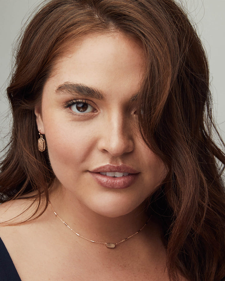 lee-gold-drop-earrings-in-white-swarovski