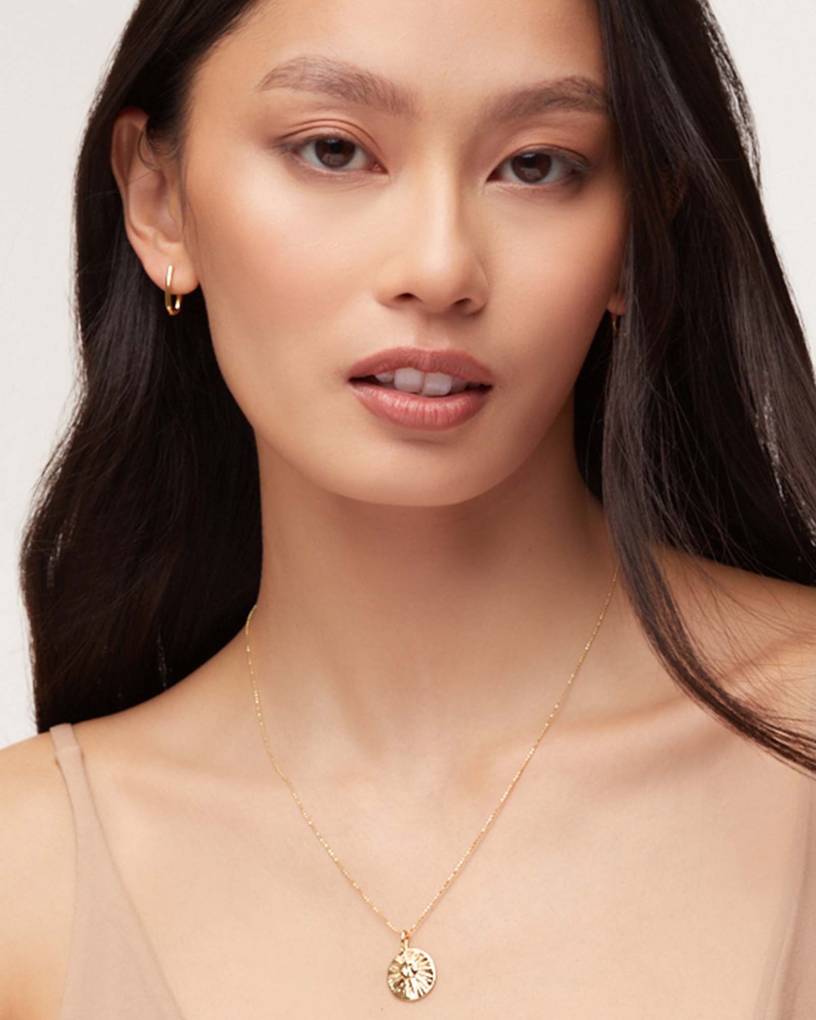 sun-coin-charm-in-18k-gold-vermeil-swarovski