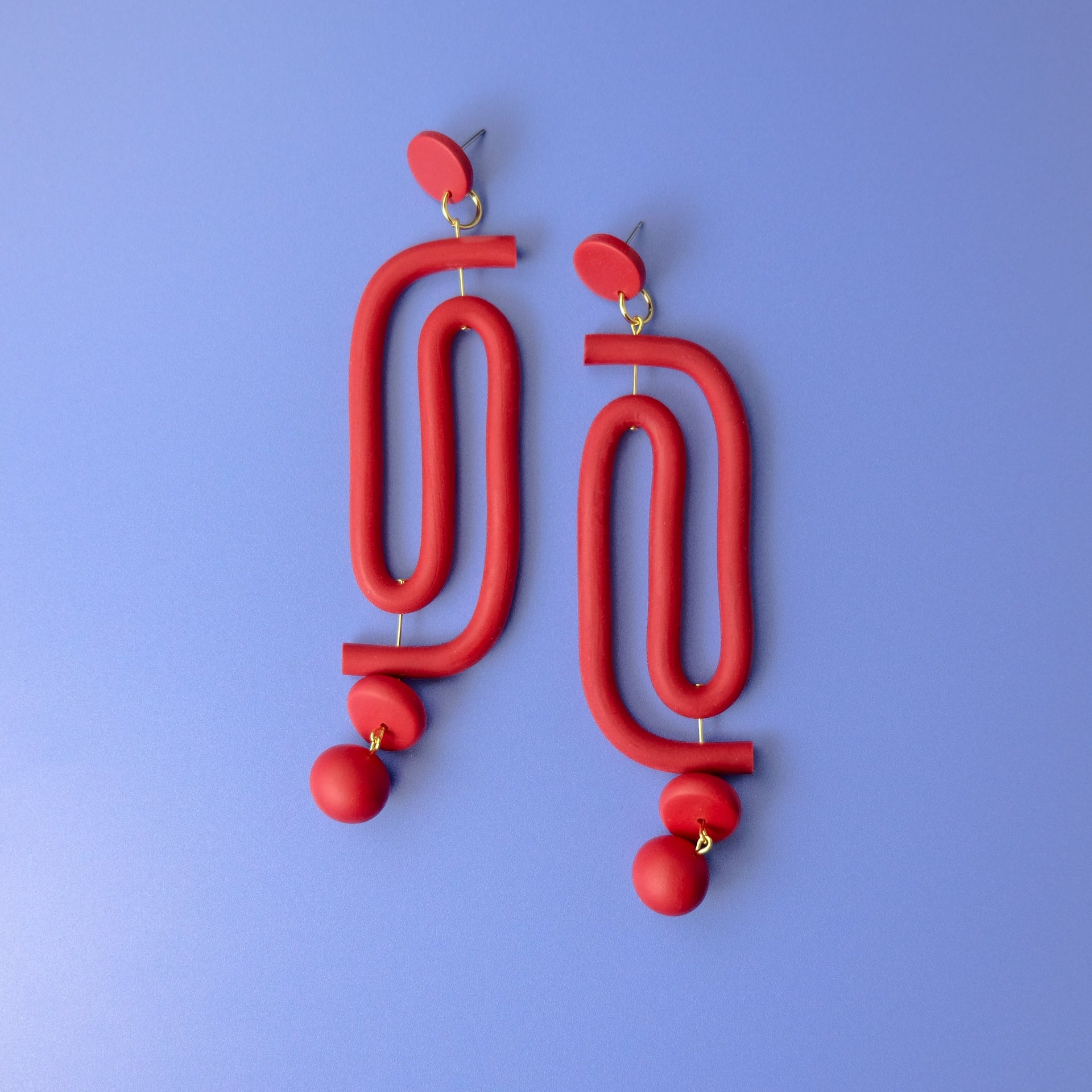 Labyrinth Dangly Statement Earrings In Red