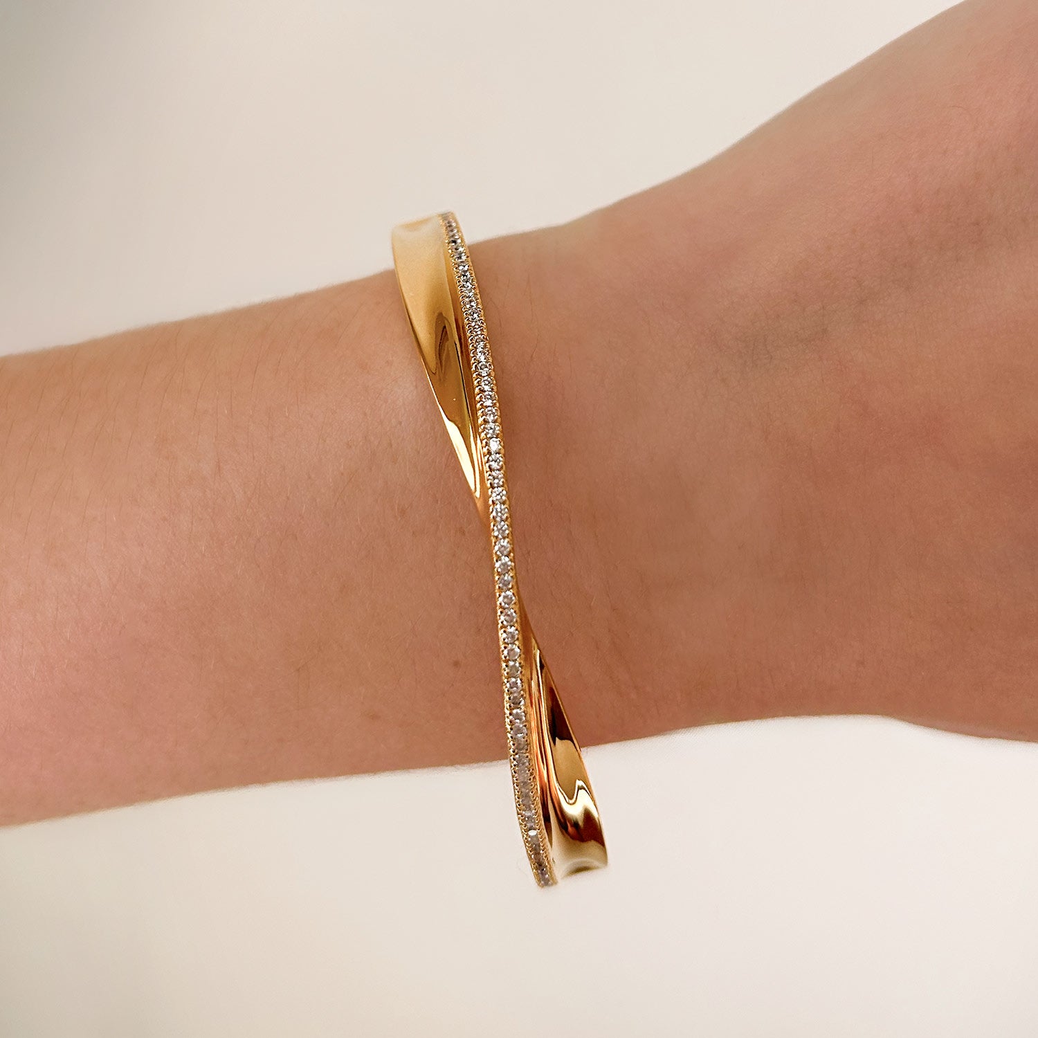 Light Bangle With Man Made White Cz Diamond Stimulant In 18K Gold Vermeil