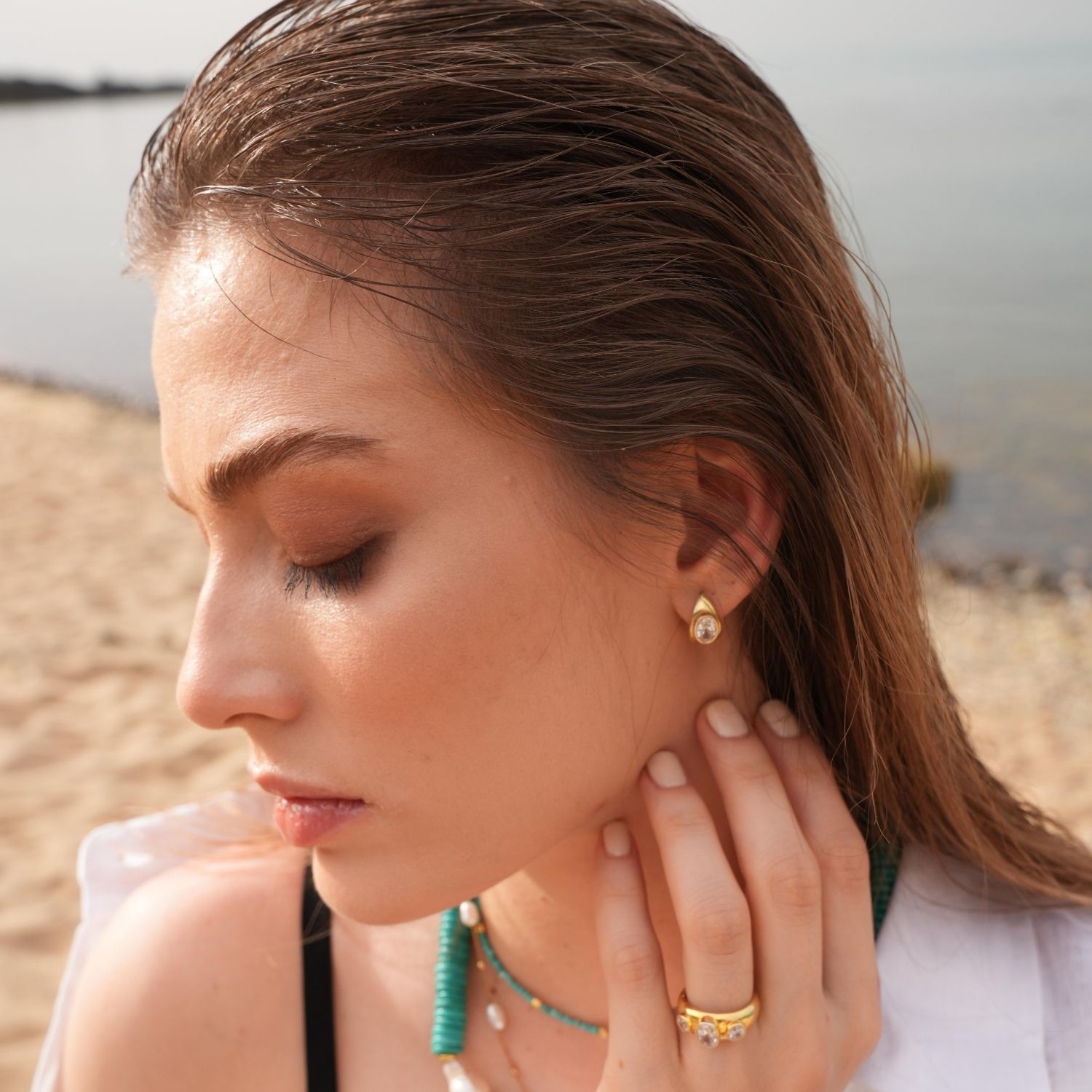 Lina White Drop Stone Huggie Earrings