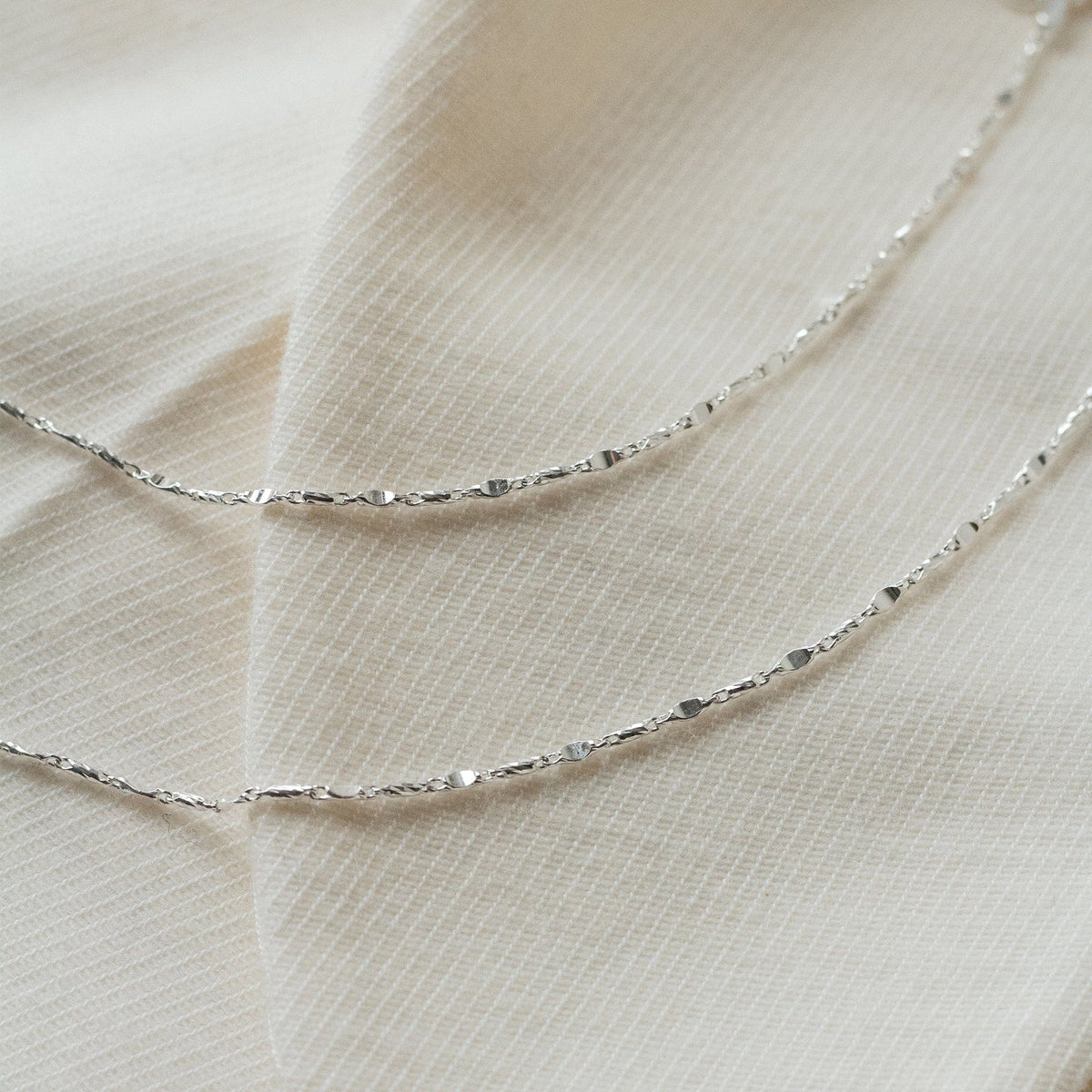 long-tidal-twist-chain-necklace-sterling-silver-daisy-london