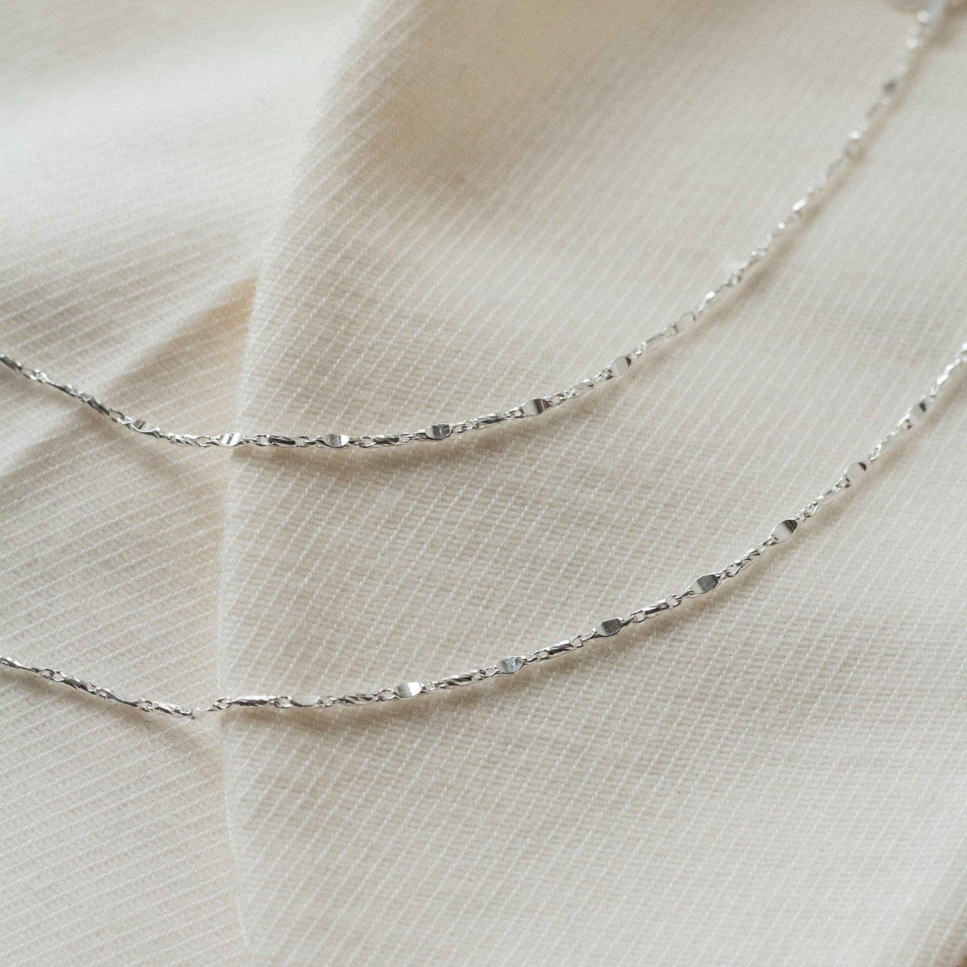 long-tidal-twist-chain-necklace-sterling-silver-daisy-london