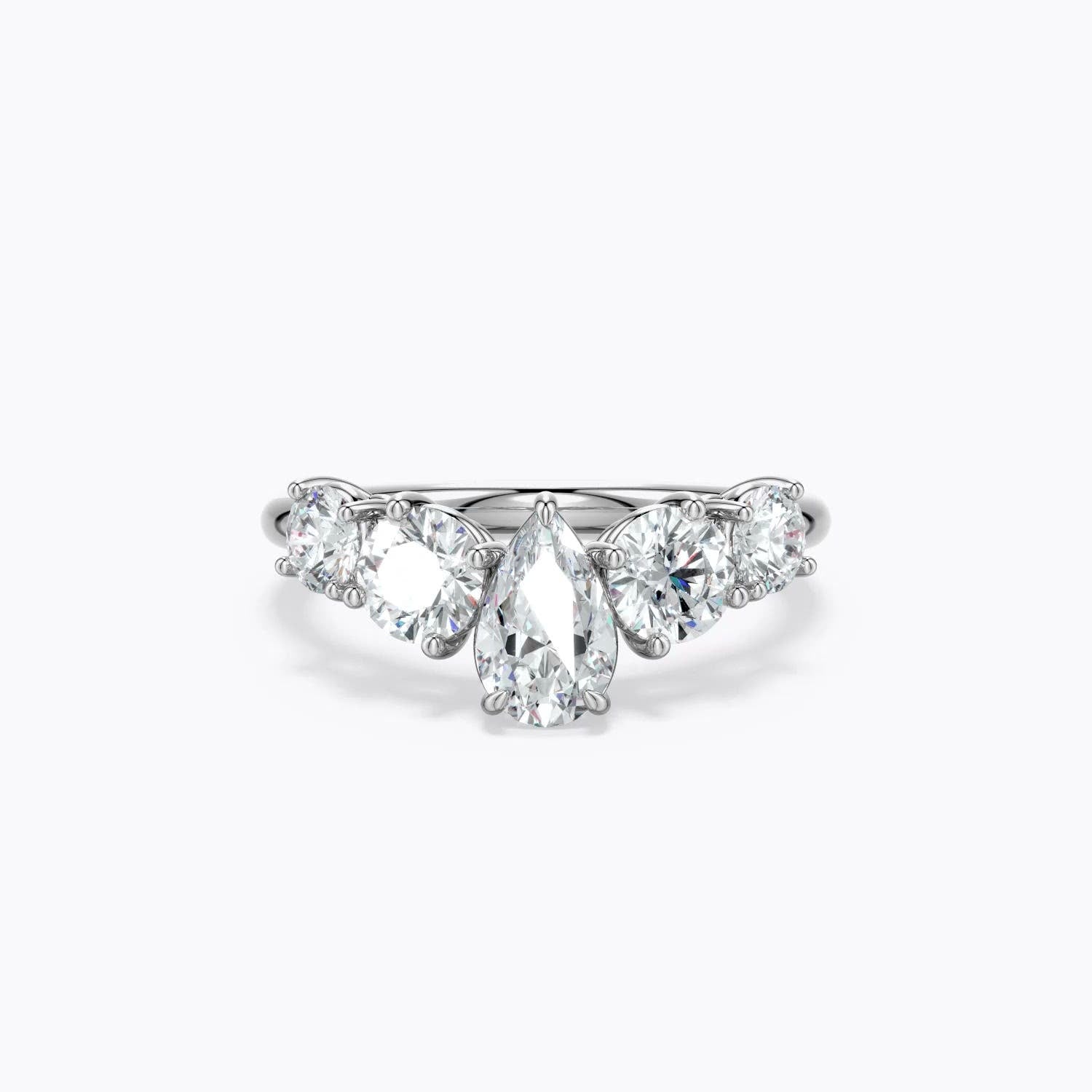 0.9 CTW Lab-Grown Off-Centered Pear Diamond Engagement Ring with Scattered Emeralds in Platinum