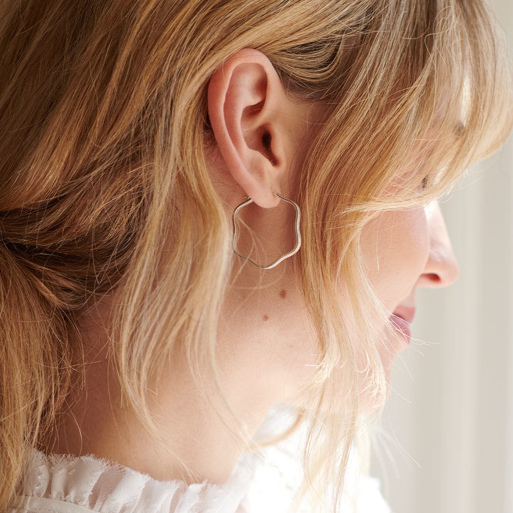 maxi-wavy-snake-hoop-earrings-sterling-silver-daisy-london