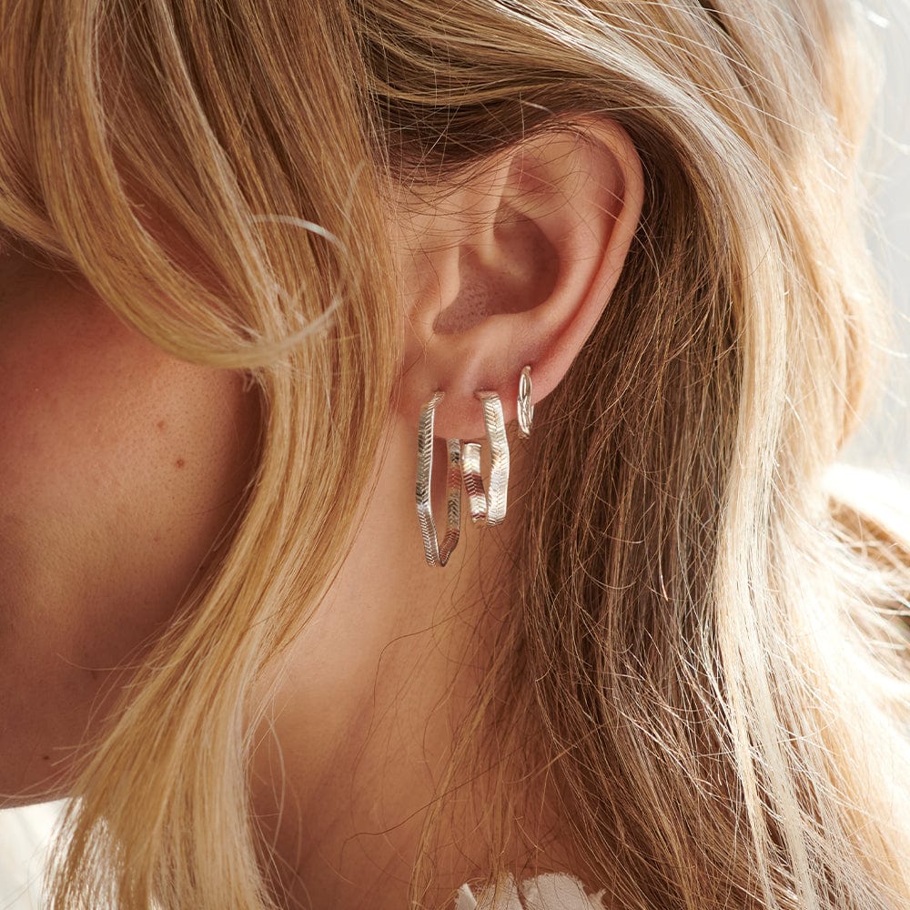 midi-wavy-snake-hoop-earrings-sterling-silver-daisy-london