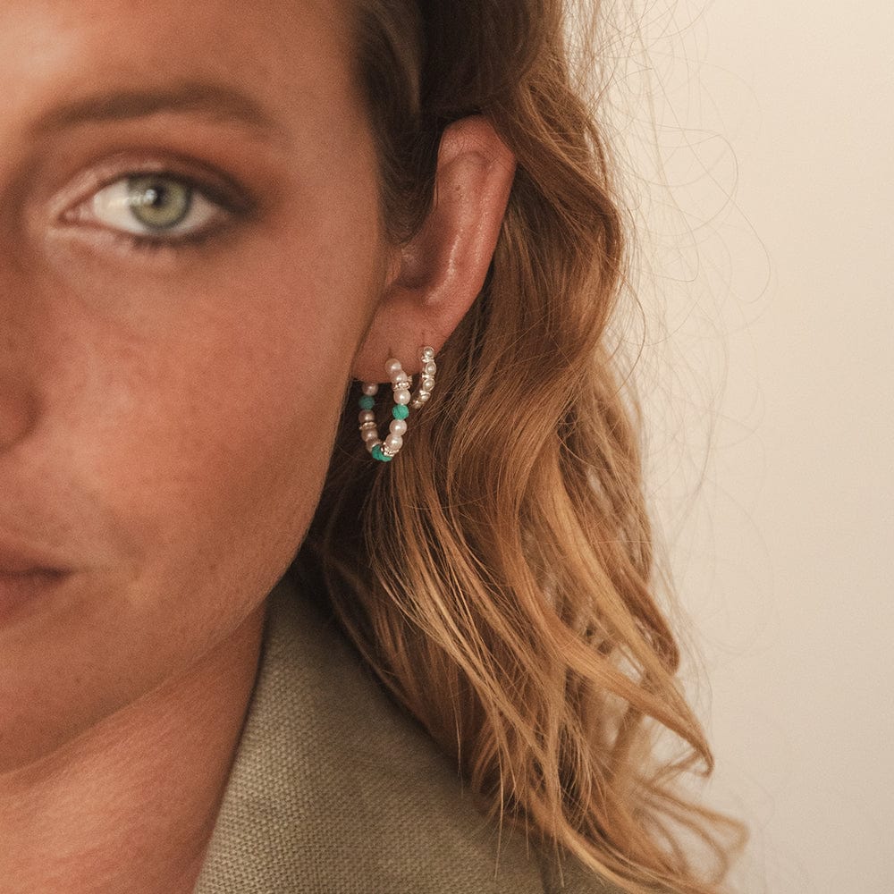 mini-pearl-huggie-earrings-sterling-silver-daisy-london