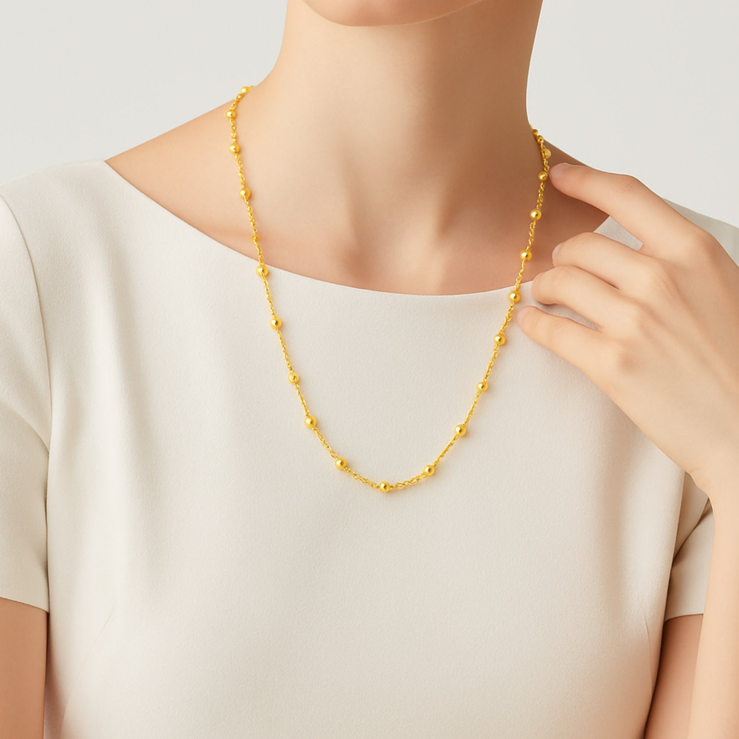 Modern Necklace In Sterling Silver With Polished Beads, Gold-Plated