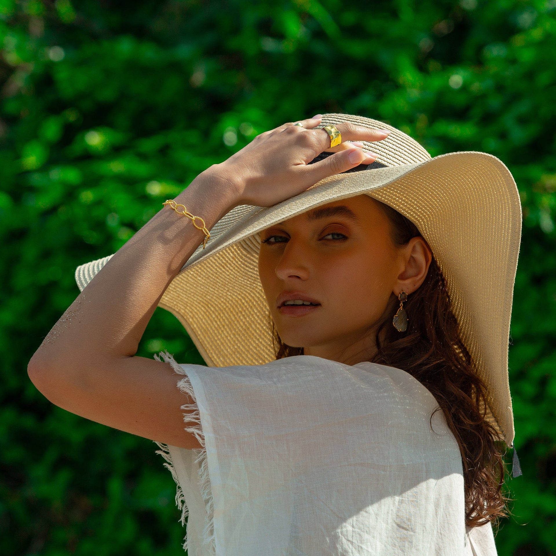 Twisted Elliptical Hoops Gold Bracelet