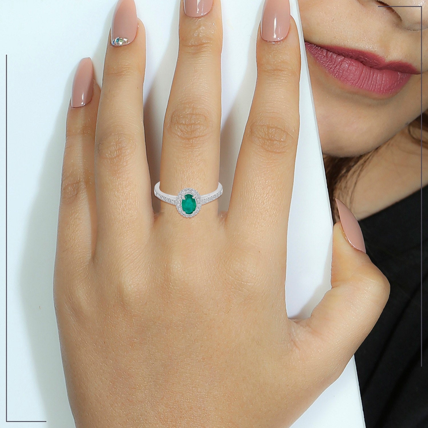 Classic Emerald And Diamond Ring In White Gold
