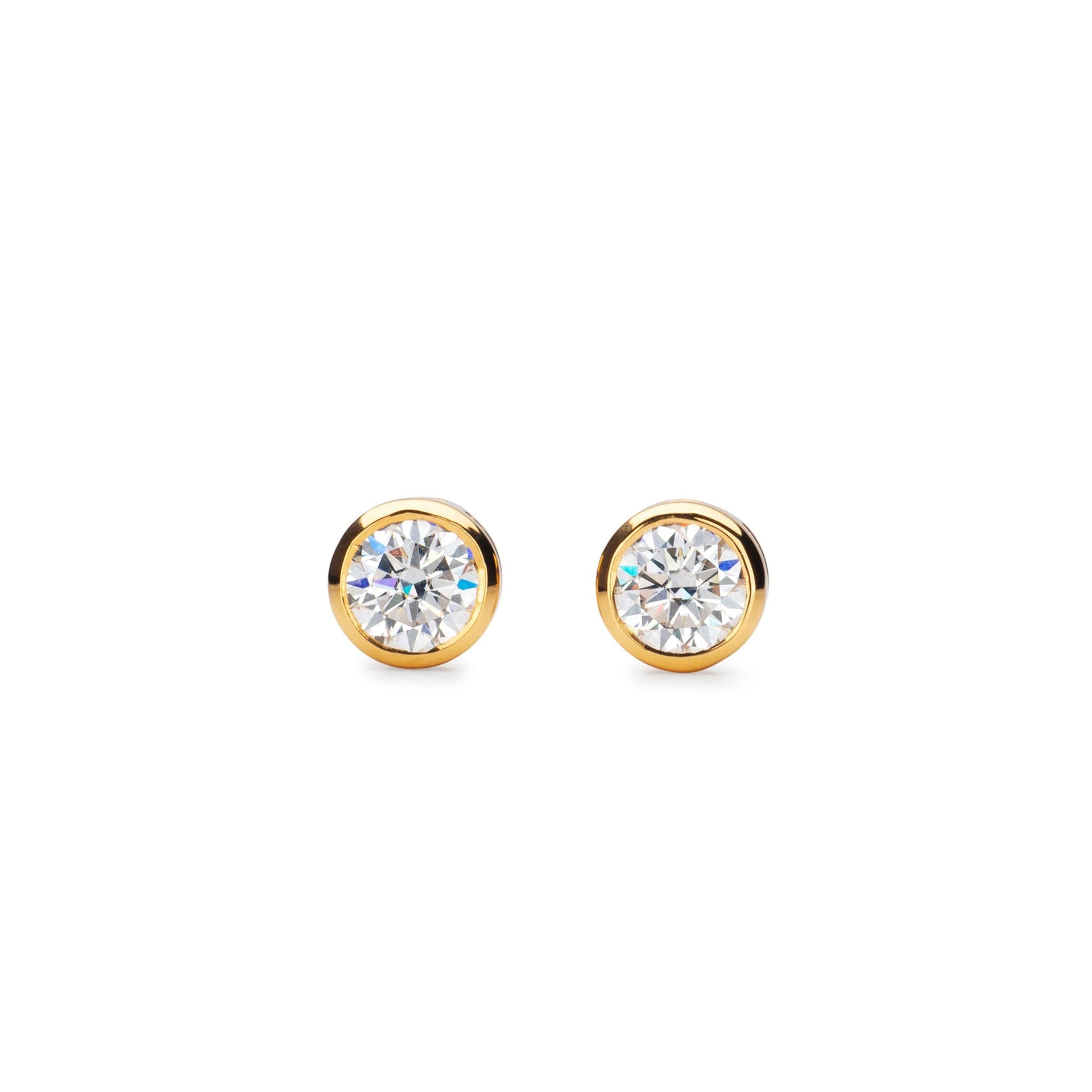 Delicate Round Shaped Gold Diamond Stud Earrings Bezel Set