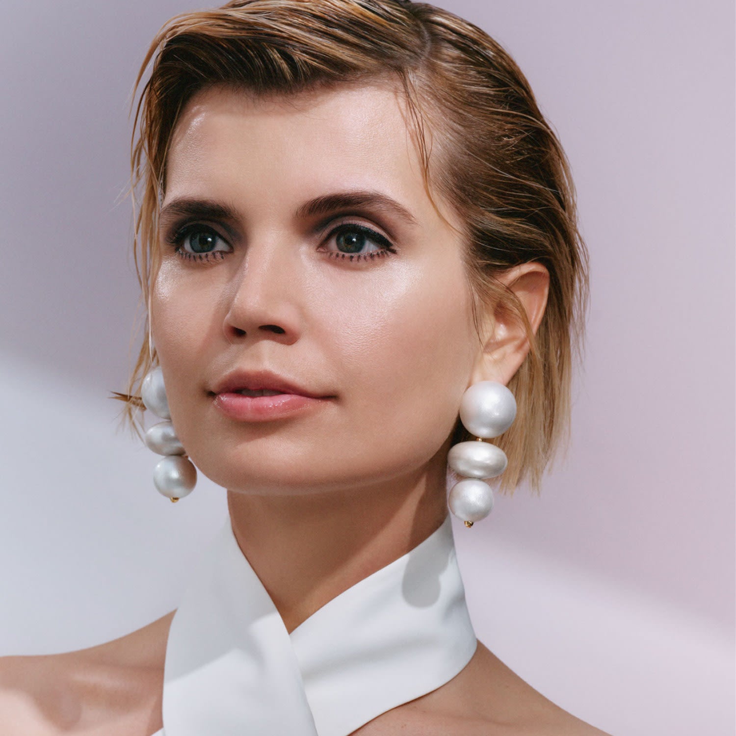 Nola Earrings In White Heron
