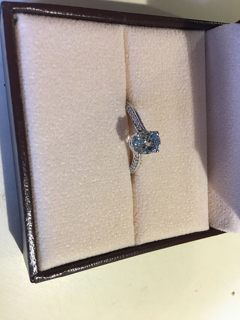 Oval Aquamarine Bypass Ring with Diamond Accents