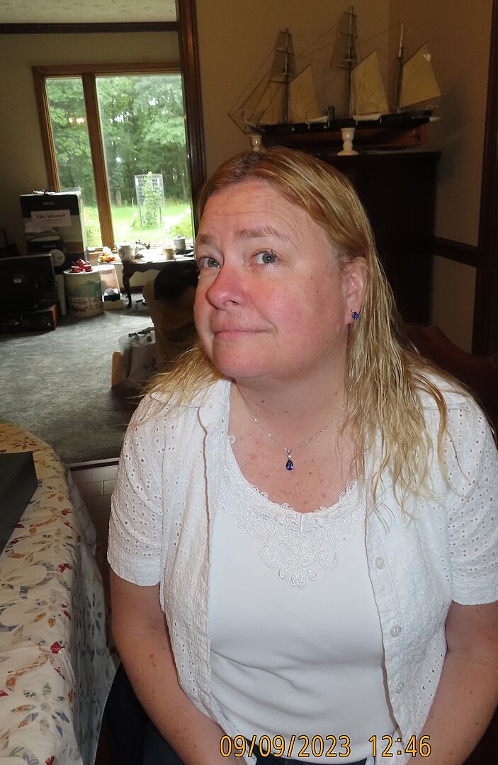 Classic Claw-Set Pear Tanzanite Solitaire Stud Earrings