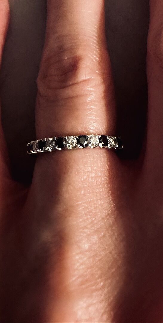 Prong-Set White and Enhanced Black Diamond Half Eternity Ring