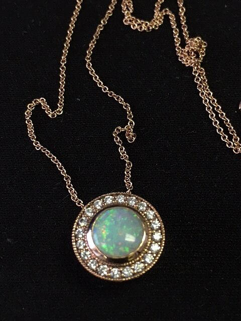 Bezel-Set Garnet Pendant with Diamond Halo