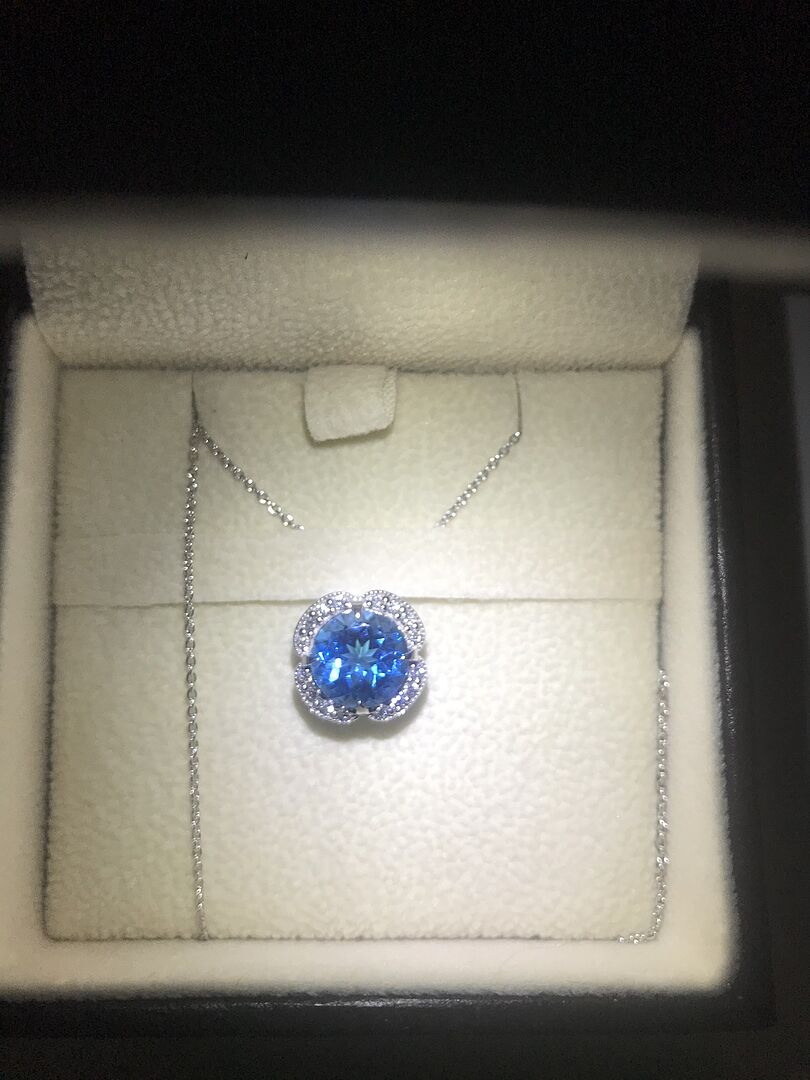 Claw-Set Swiss Blue Topaz Clover Pendant with Diamond Halo