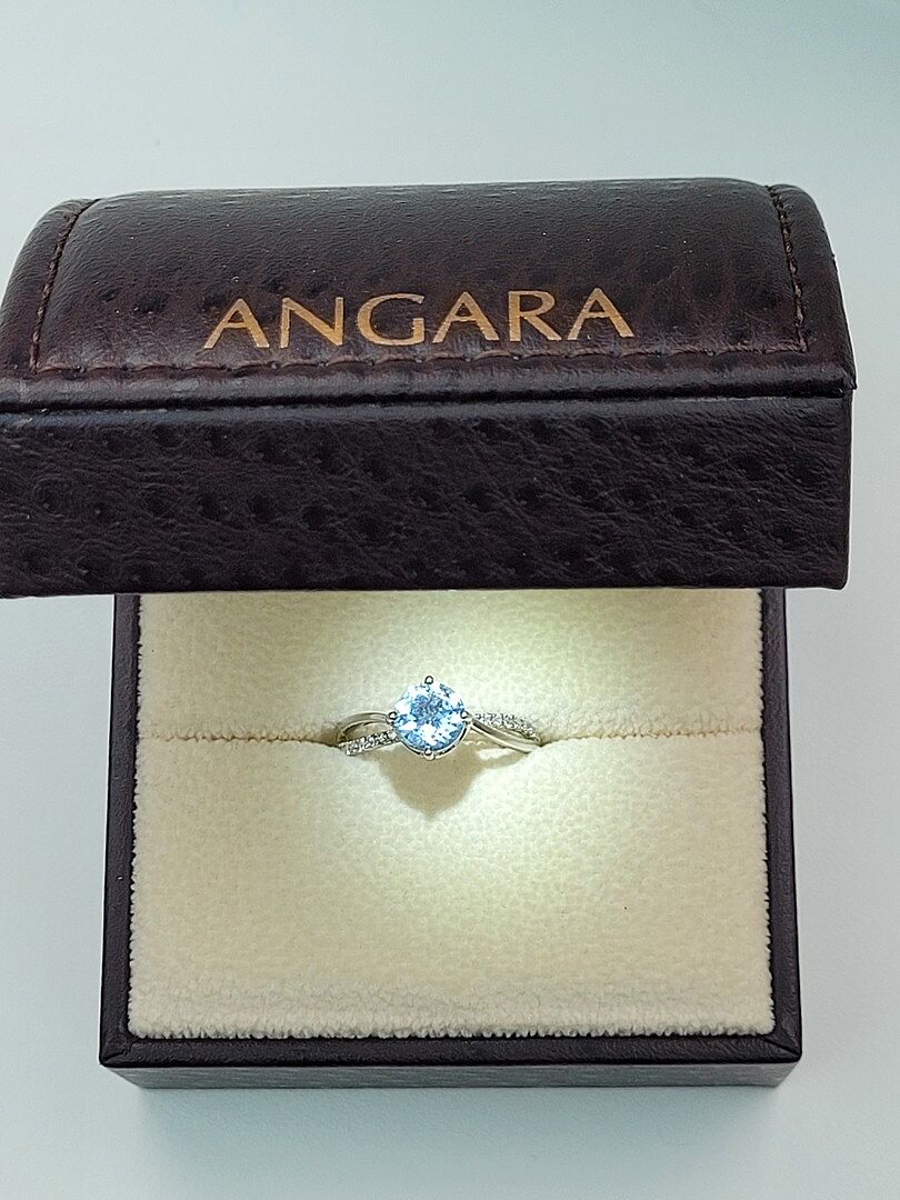 Round Aquamarine Split Shank Engagement Ring with Diamond Accents