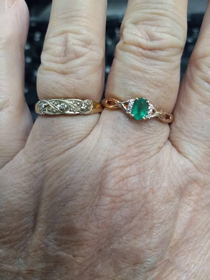 Oval Emerald Crossover Engagement Ring with Diamond Accents