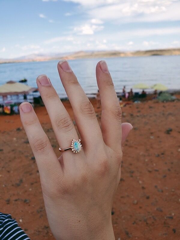 Claw-Set Pear Opal Ring with Diamond Halo