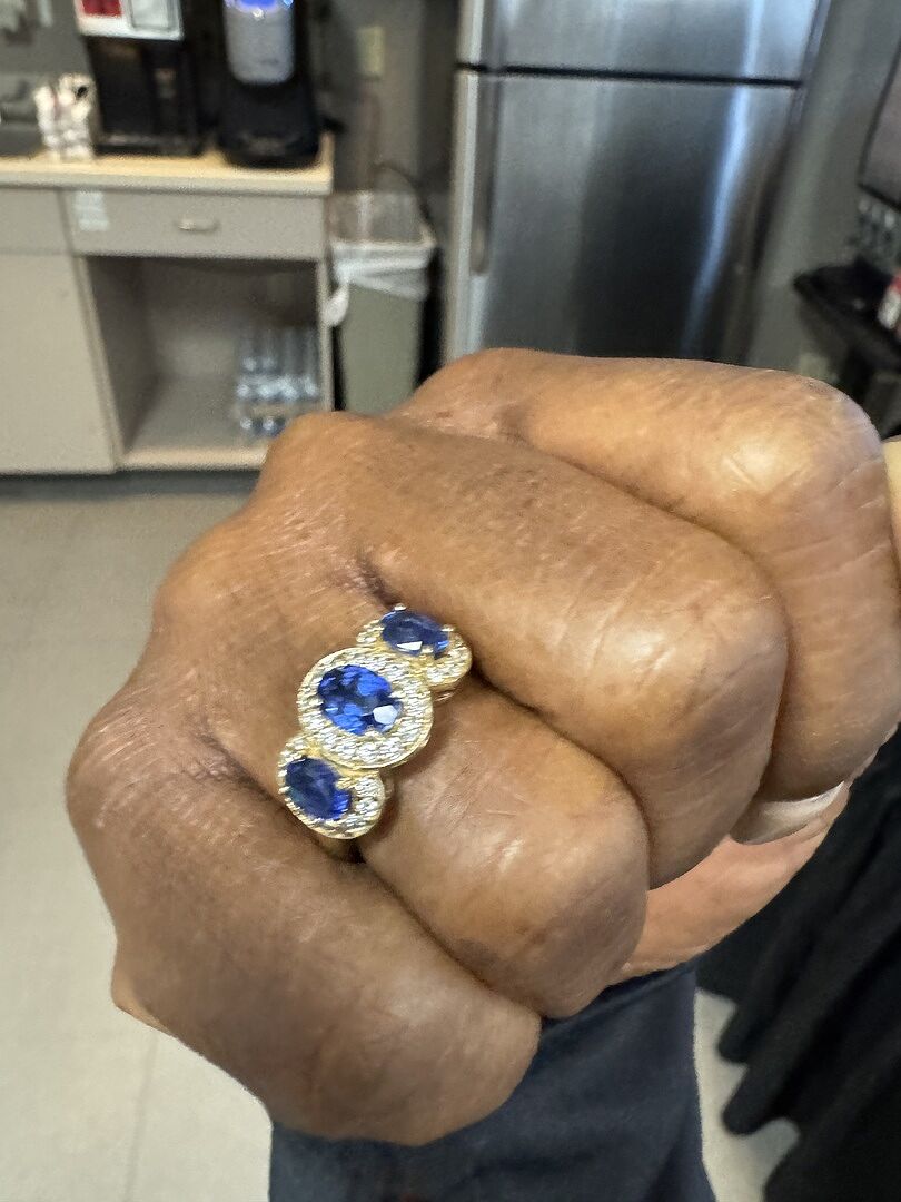 Lab-Grown Classic Three Stone Blue Sapphire Ring with Diamond Halo