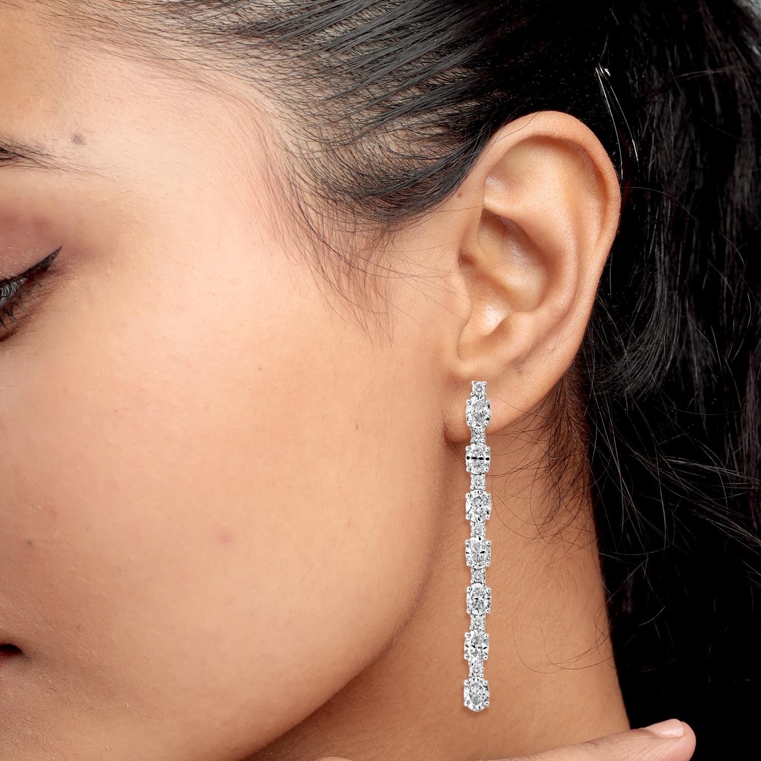 Oval Cut Diamond Dangle Earrings In White Gold