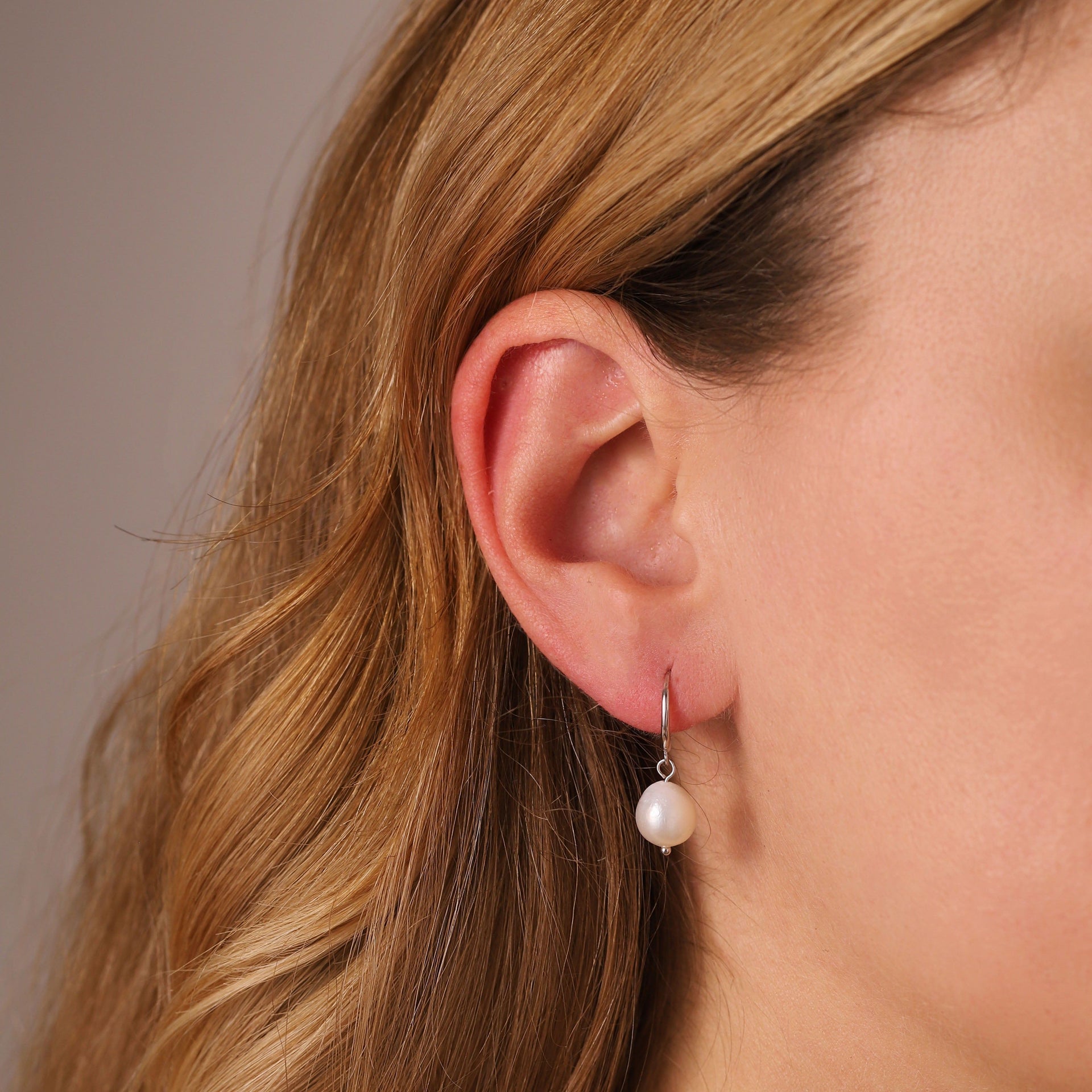 Pearl Drop Huggie Hoops In Silver