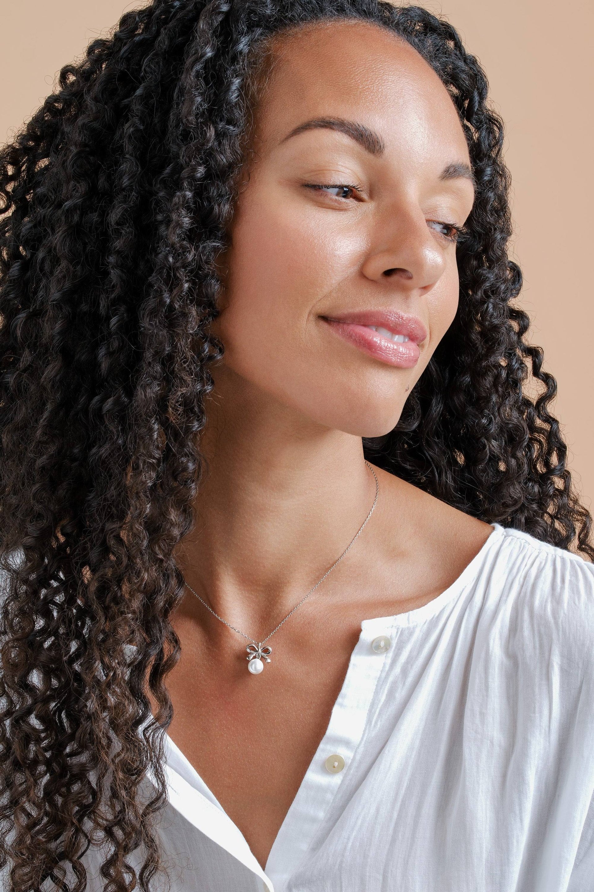 Platinum Bow & Pearl Pendant